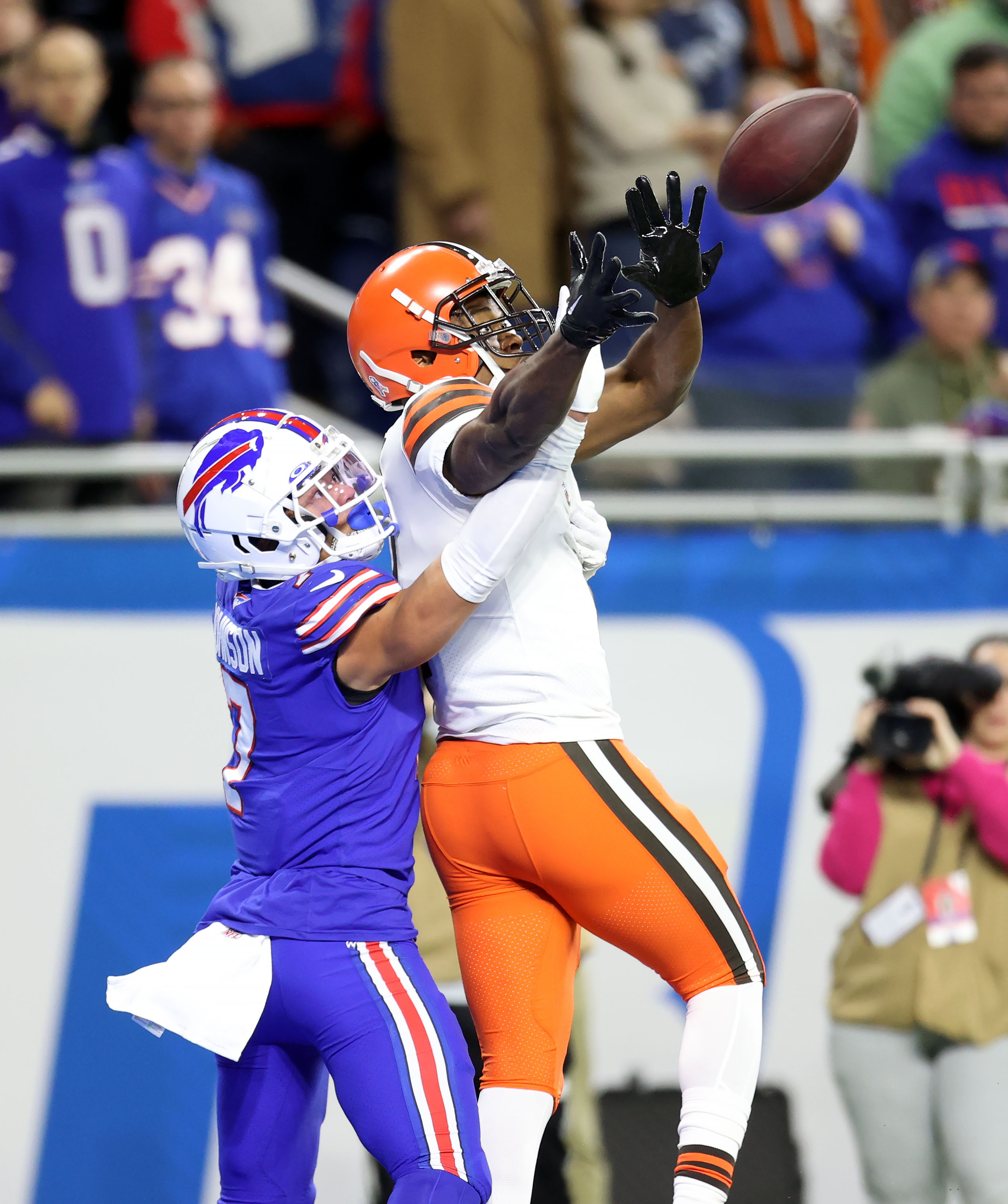 Tyrel Dodson of the Buffalo Bills tackles Nick Chubb of the