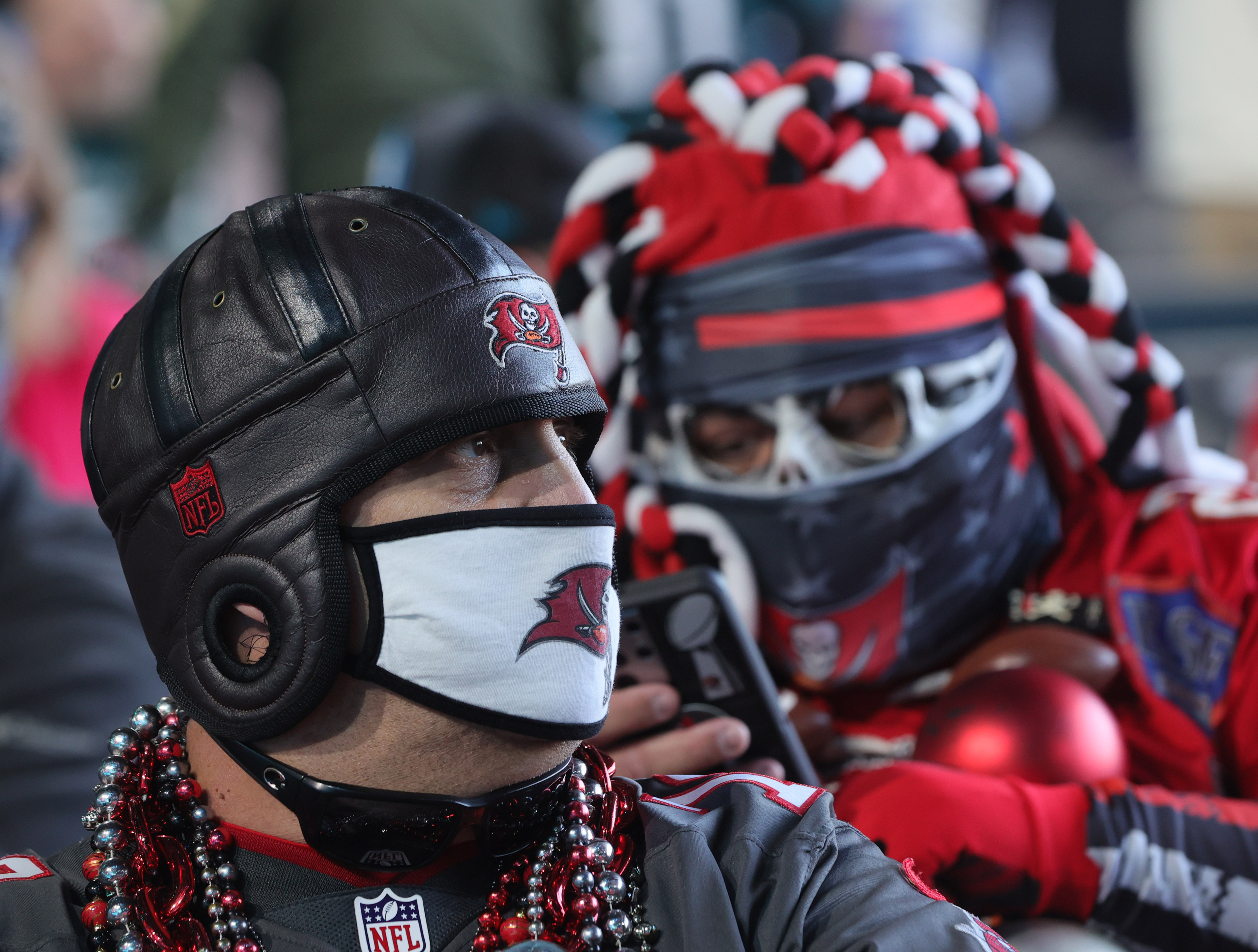 NFL jerseys and team costumes seen in downtown Cleveland during