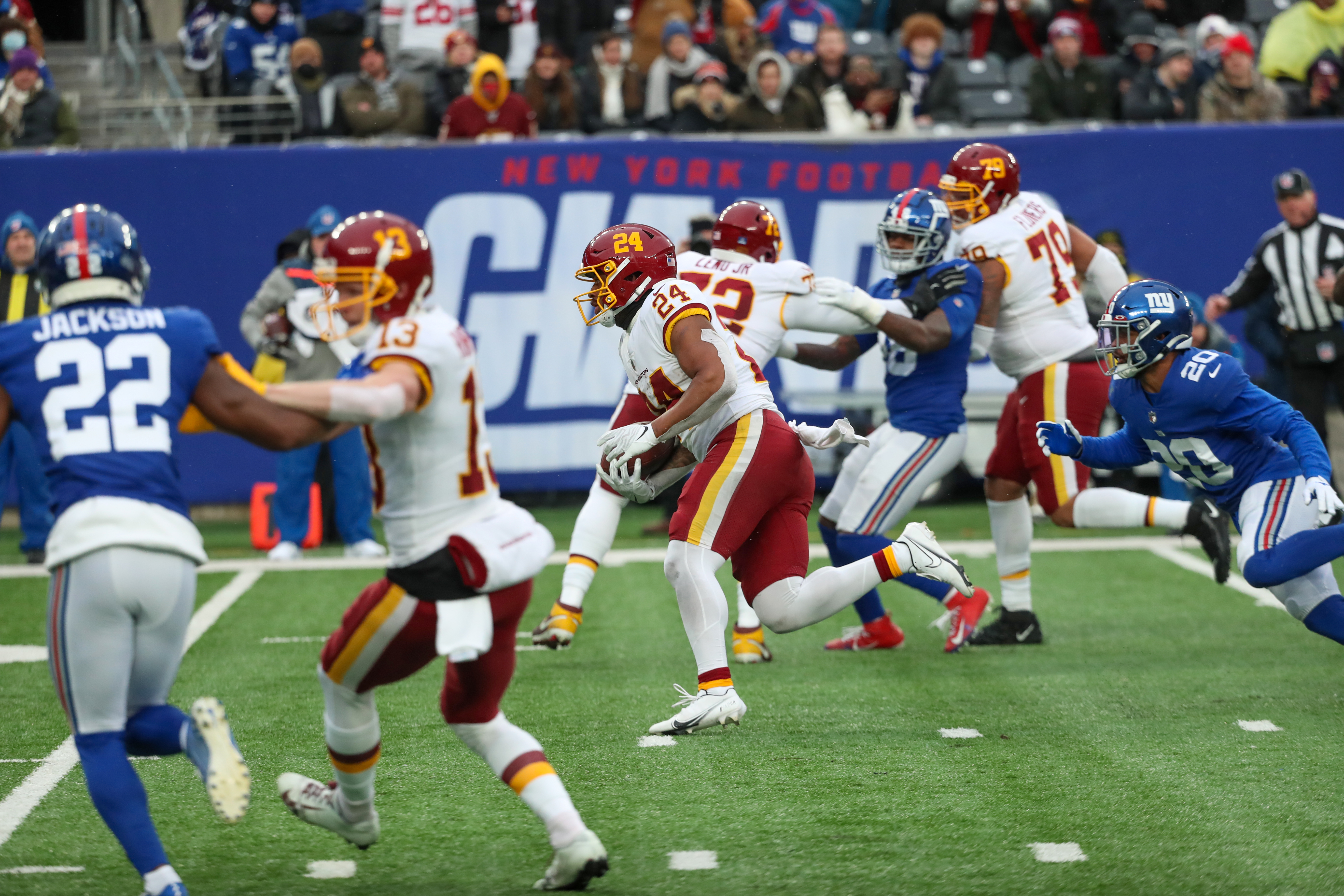 Washington Football Team running back Antonio Gibson (24) scores a rushing touchdown during the fourth quarter against the New York Giants on Sunday, Jan. 9, 2022 in East Rutherford, N.J. Washington won, 22-7.