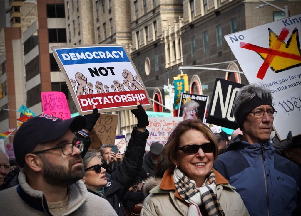 Photos: Tens of thousands march through Times Square in ‘No Kings ...