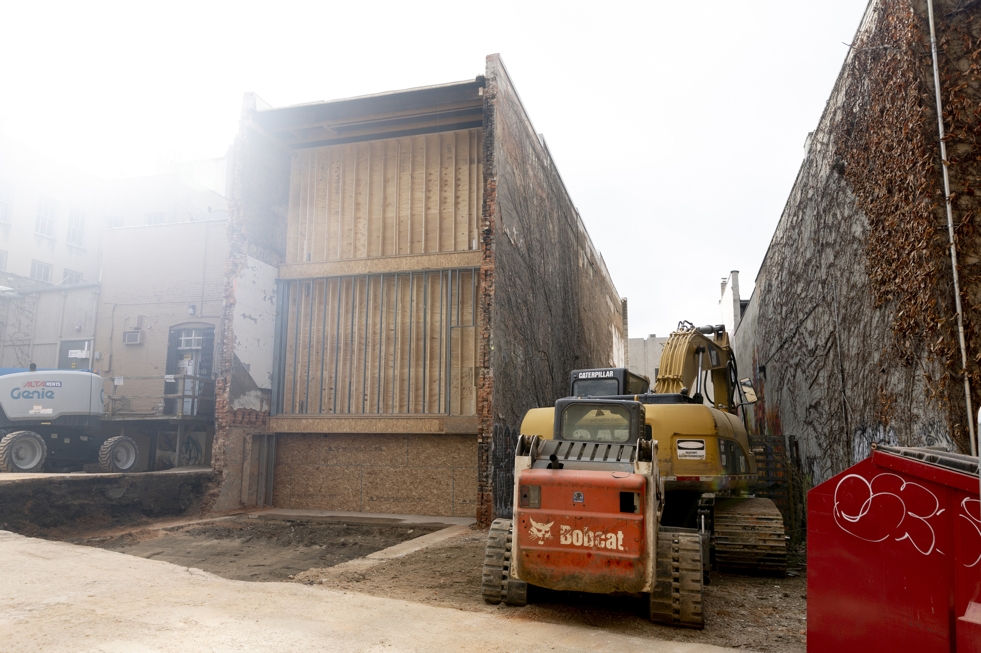 Downtown Flint building partially demolished in Brush Alley