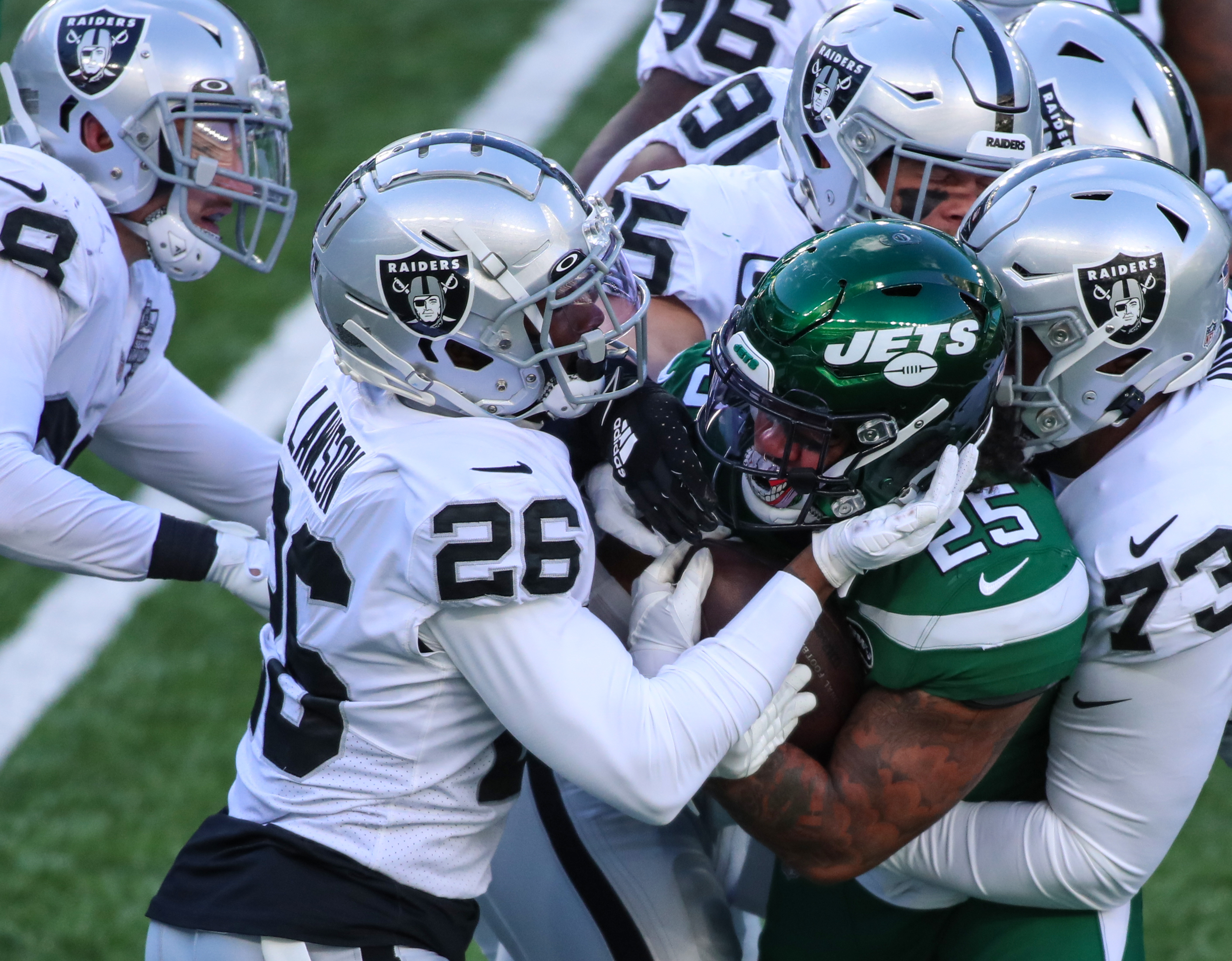 East Rutherford, New Jersey, USA. 6th Dec, 2020. Las Vegas Raiders wide  receiver Henry Ruggs III (11) in action against New York Jets free safety  Marcus Maye (20) during the NFL game