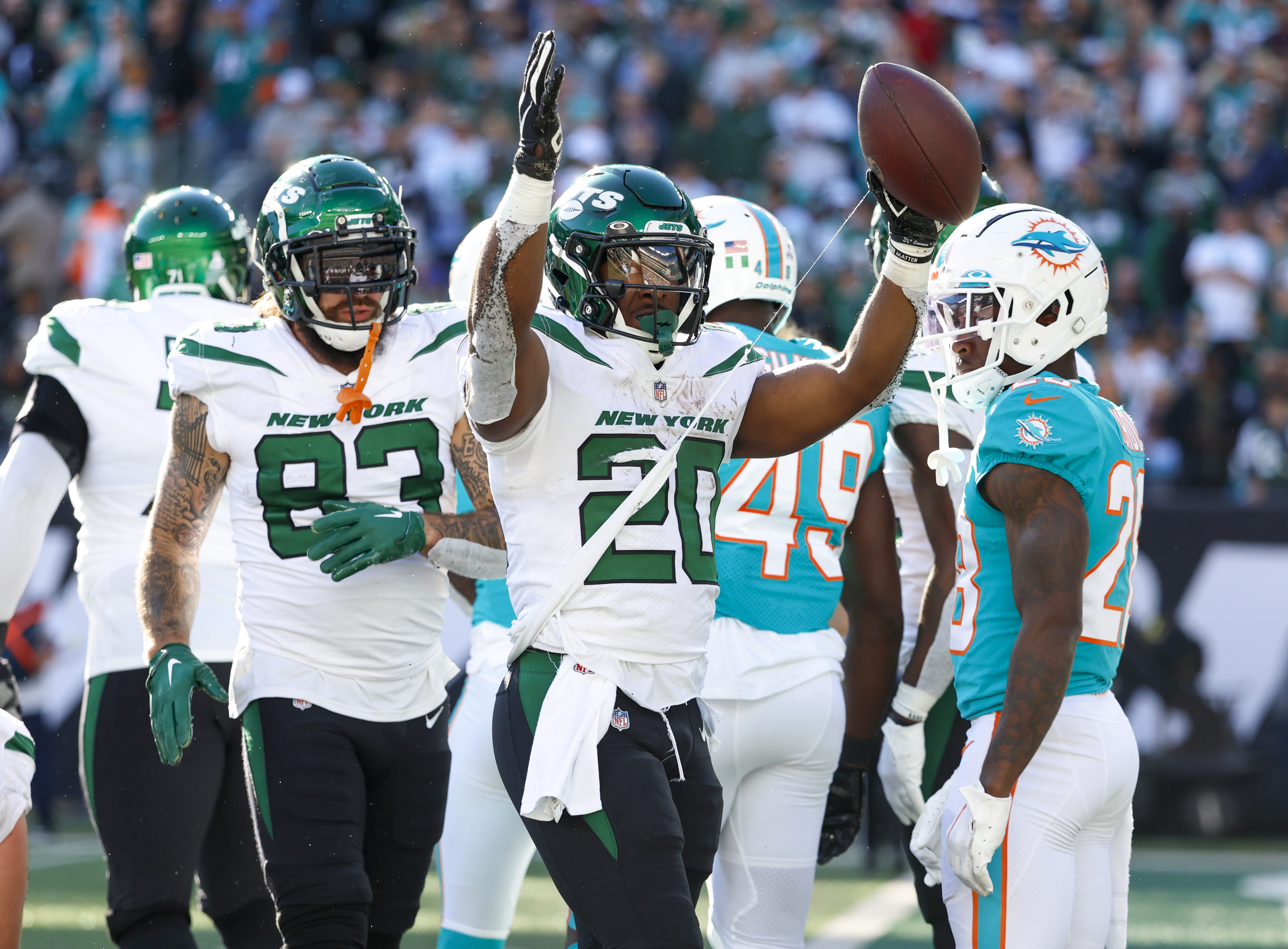 New York Jets running back Breece Hall (20) rushes against Miami Dolphins  during the first half of an NFL football game on Sunday, Oct. 9, 2022, in  East Rutherford, N.J. (AP Photo/Noah