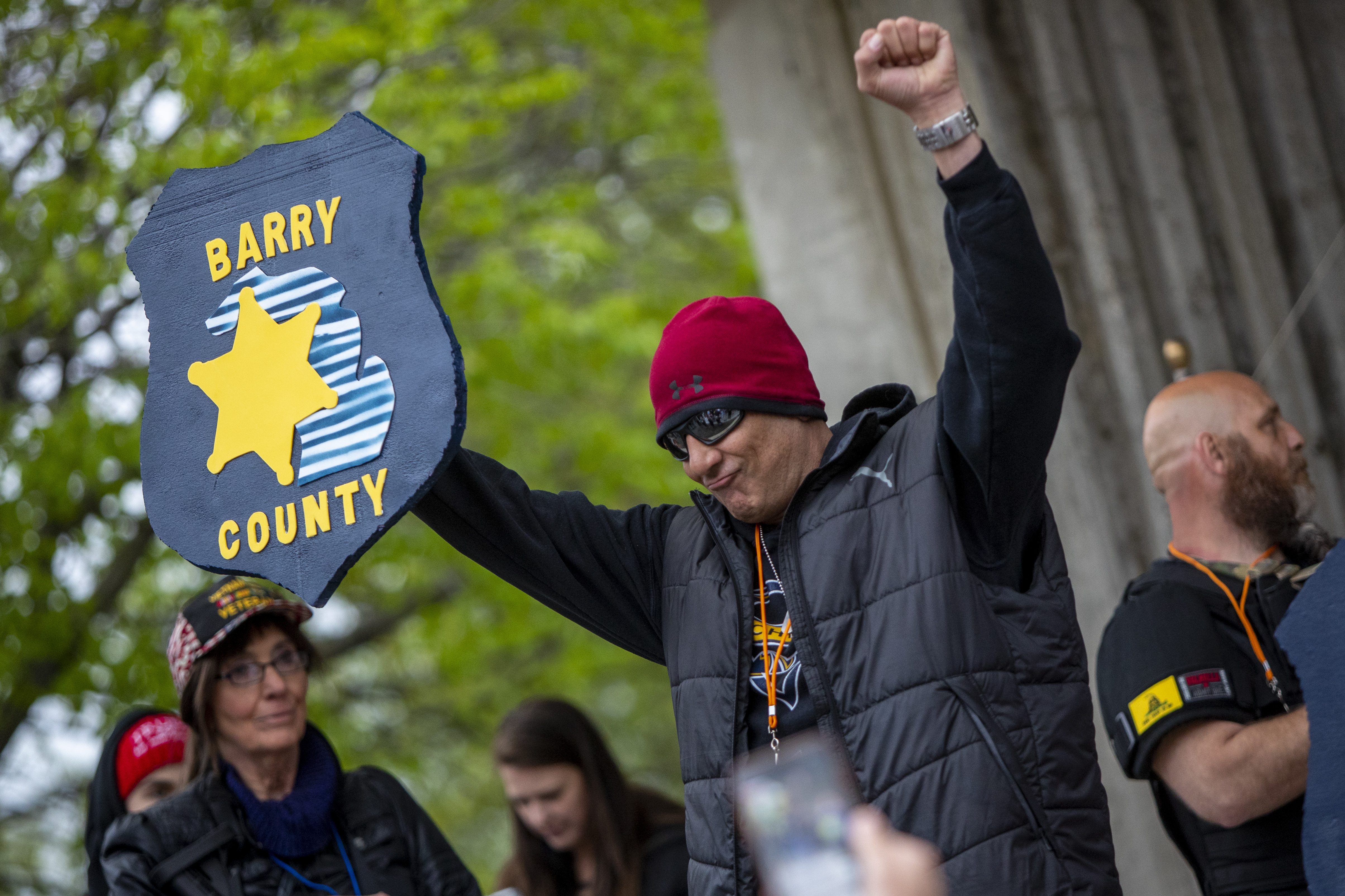 Mark Stevens takes part in the "American Patriot Rally-Sheriffs speak out" event at Rosa Parks Circle in downtown Grand Rapids on Monday, May 18, 2020. The crowd is protesting against Gov. Gretchen Whitmer's stay-at-home order. (Cory Morse | MLive.com)