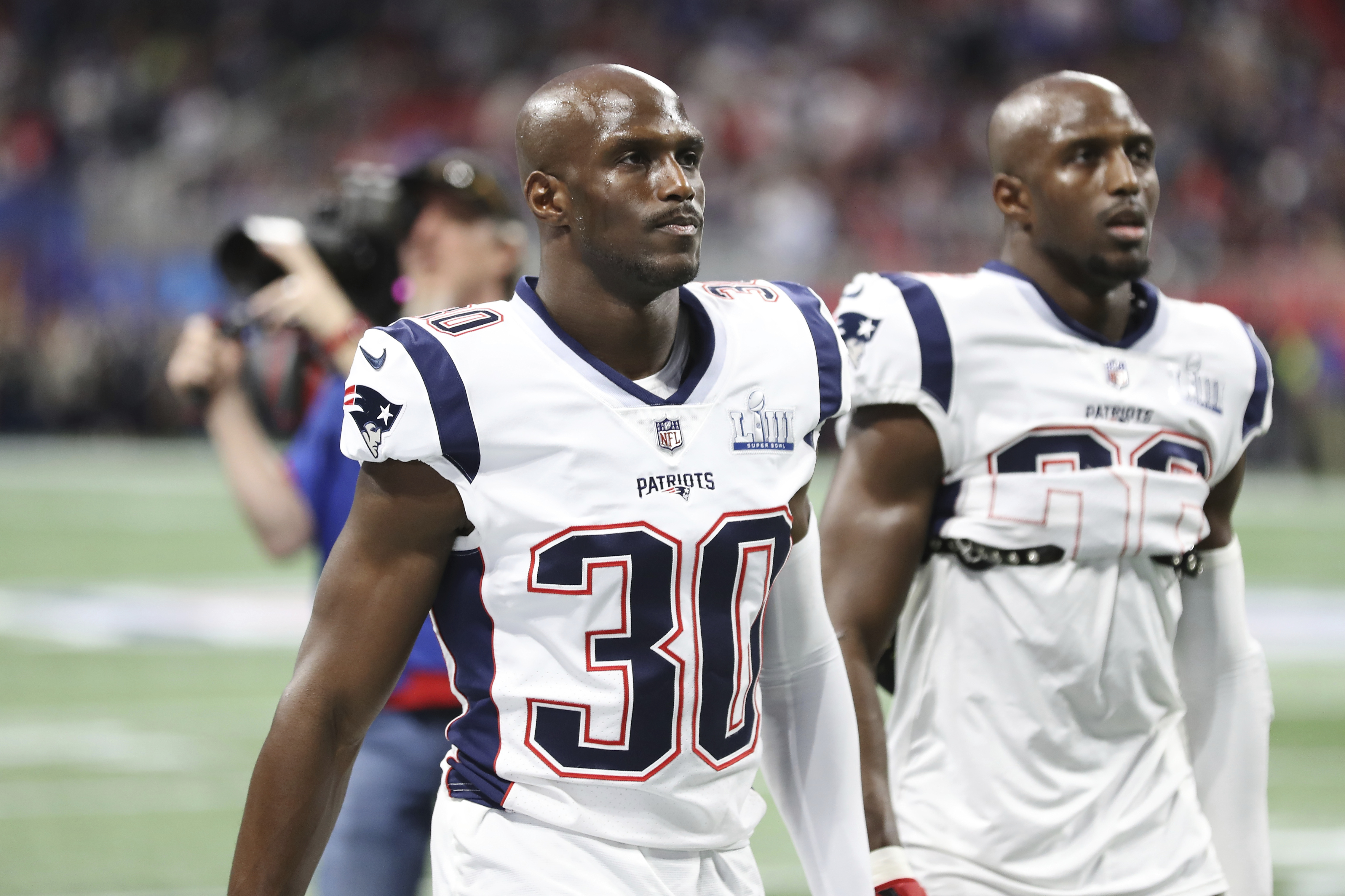 New England Patriots safety Devin McCourty and cornerback Jason