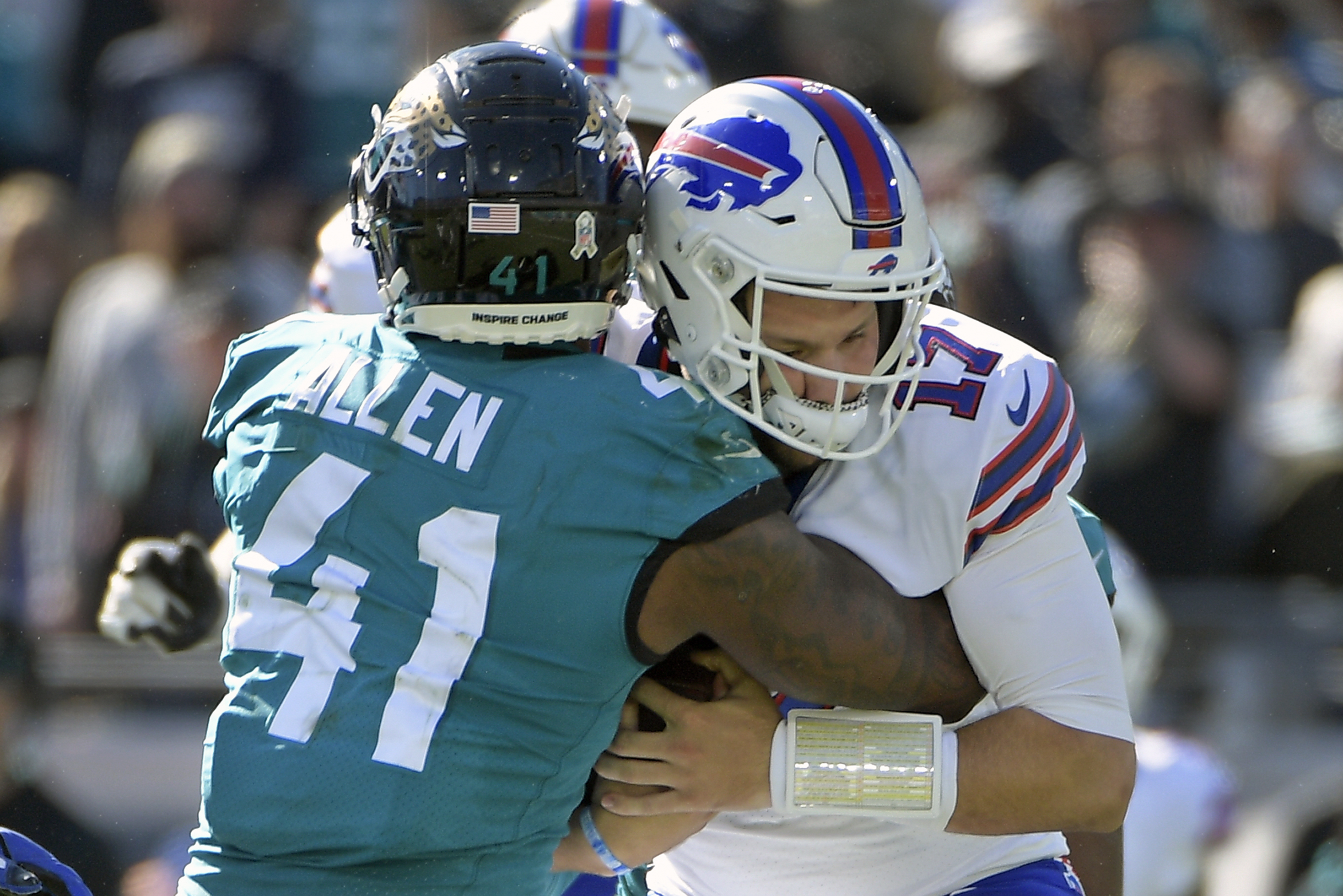 Jacksonville Jaguars linebacker Josh Allen (41) jogs onto the