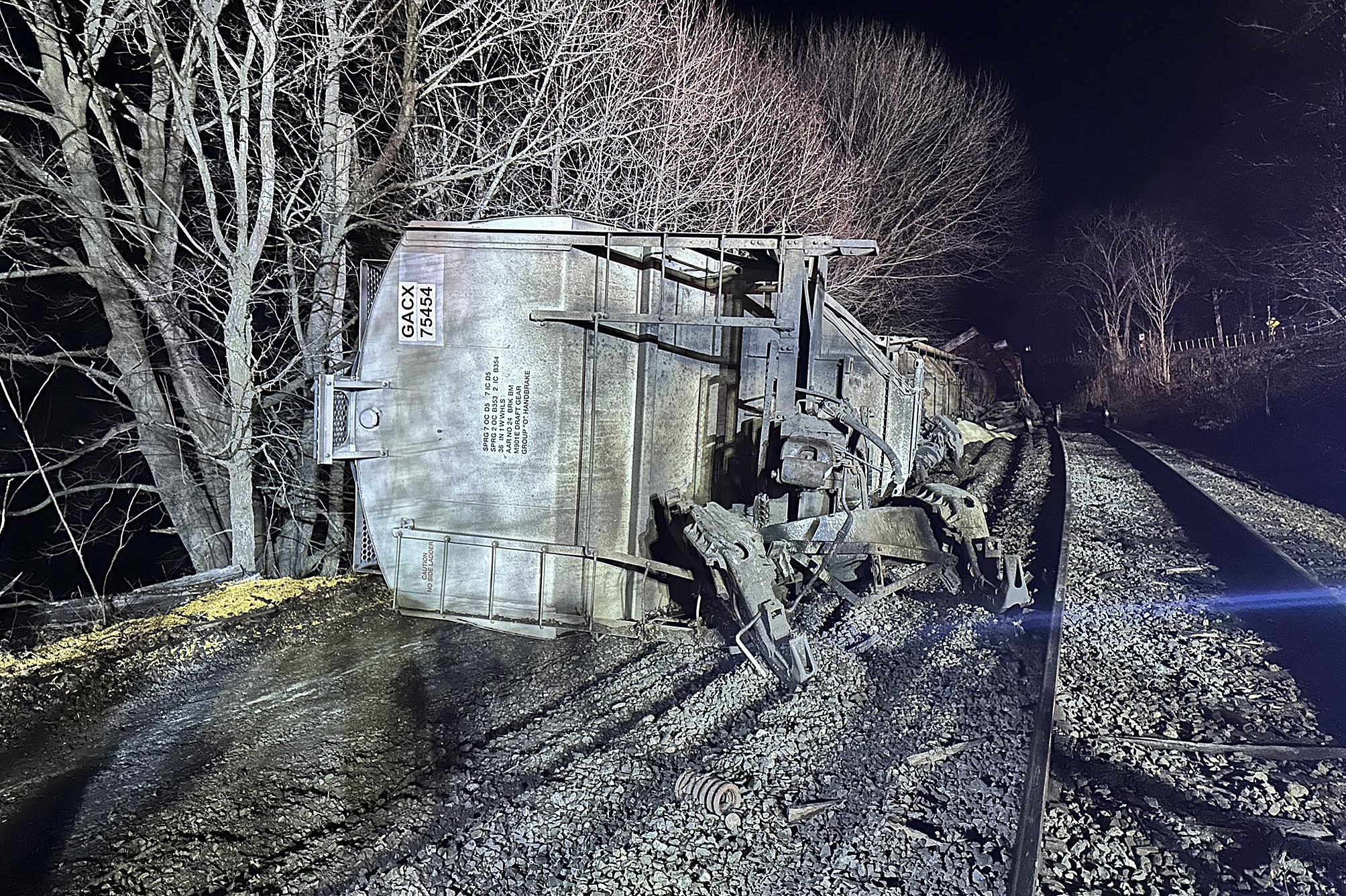 10 cars of cargo train carrying cooking oil and plastic pellets