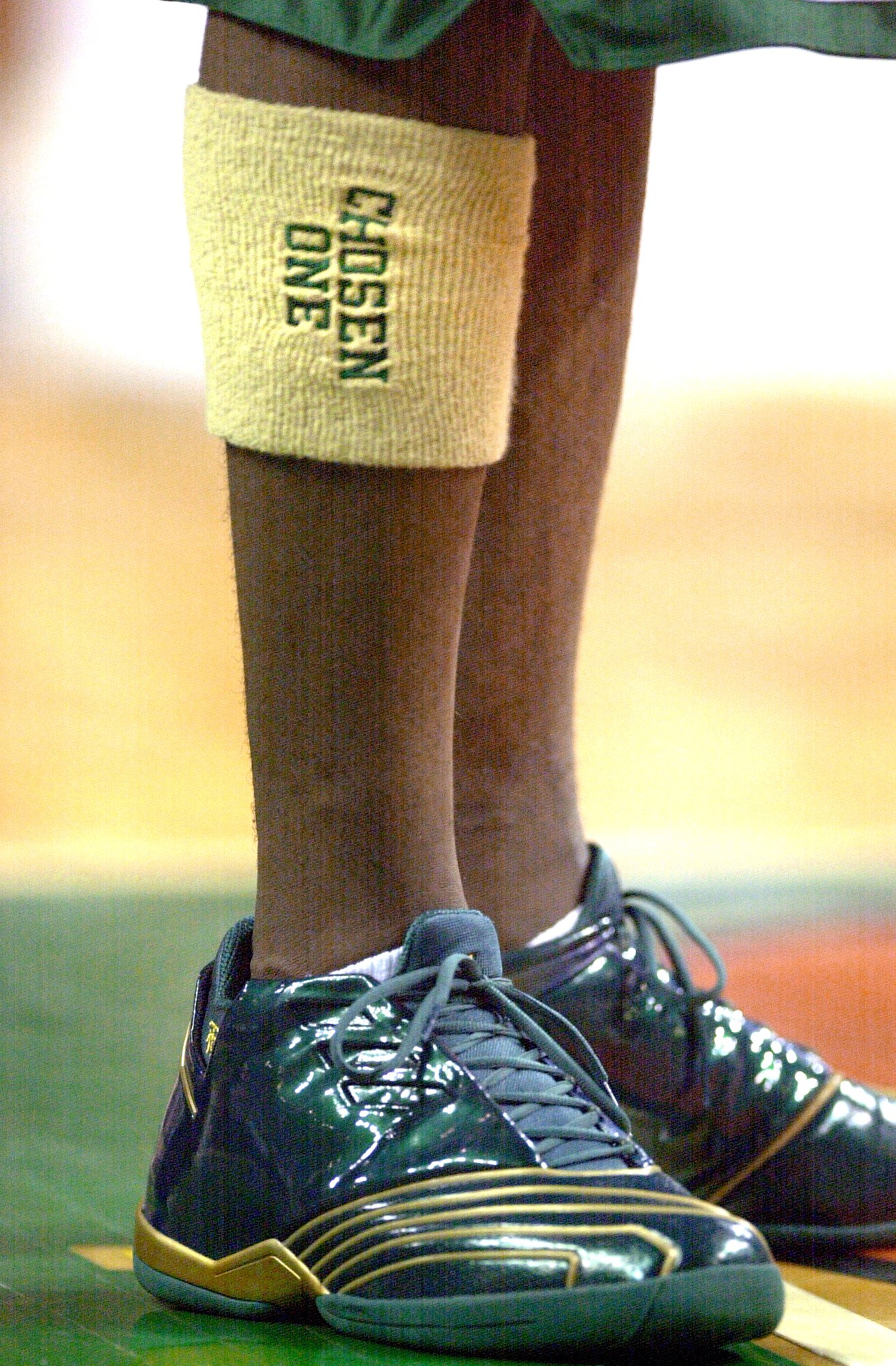 LeBron James #23 of St Vincent-St Mary High School wears a sweatband on his leg that reads, 