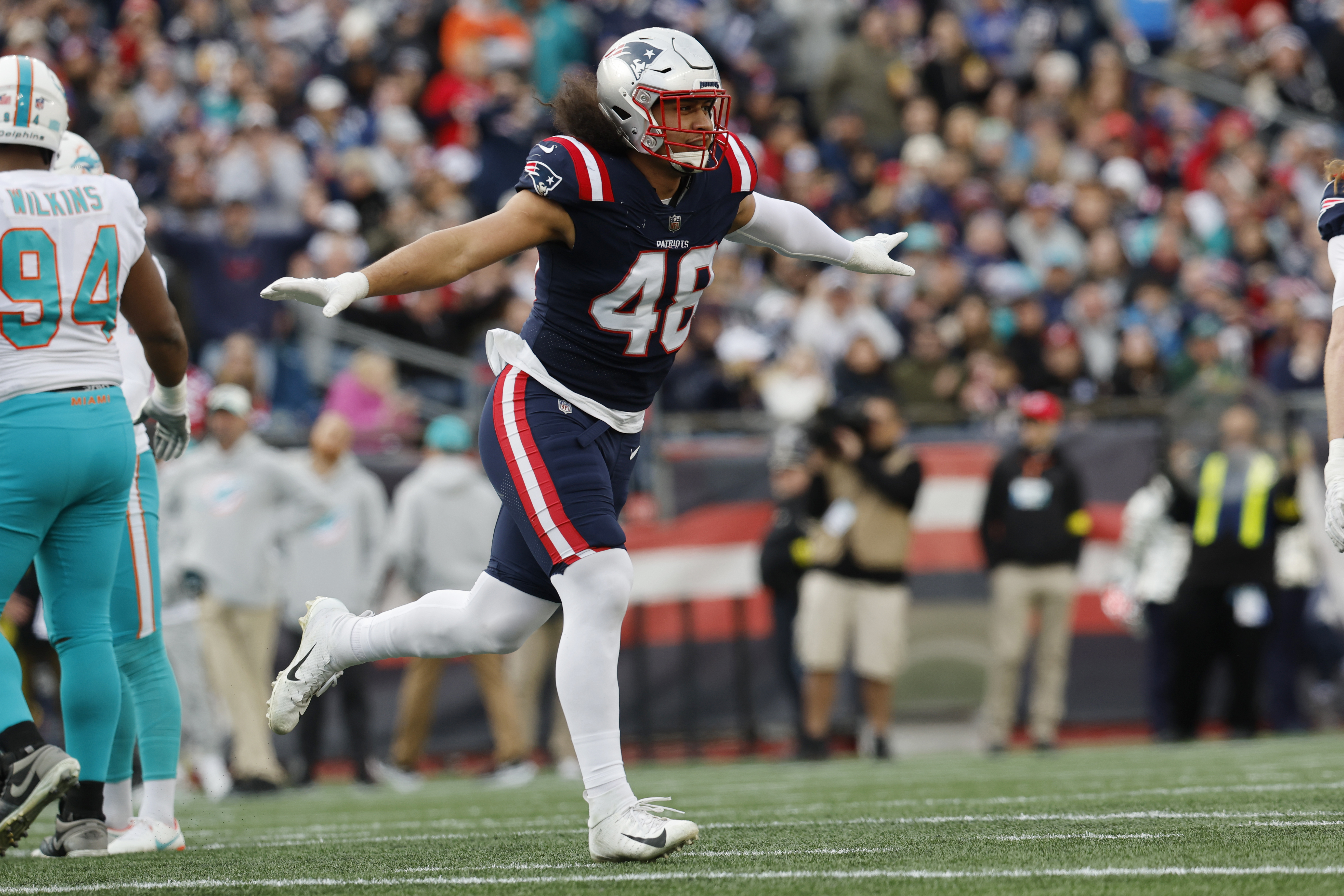 Patriots keep playoff hopes alive with vital home win over