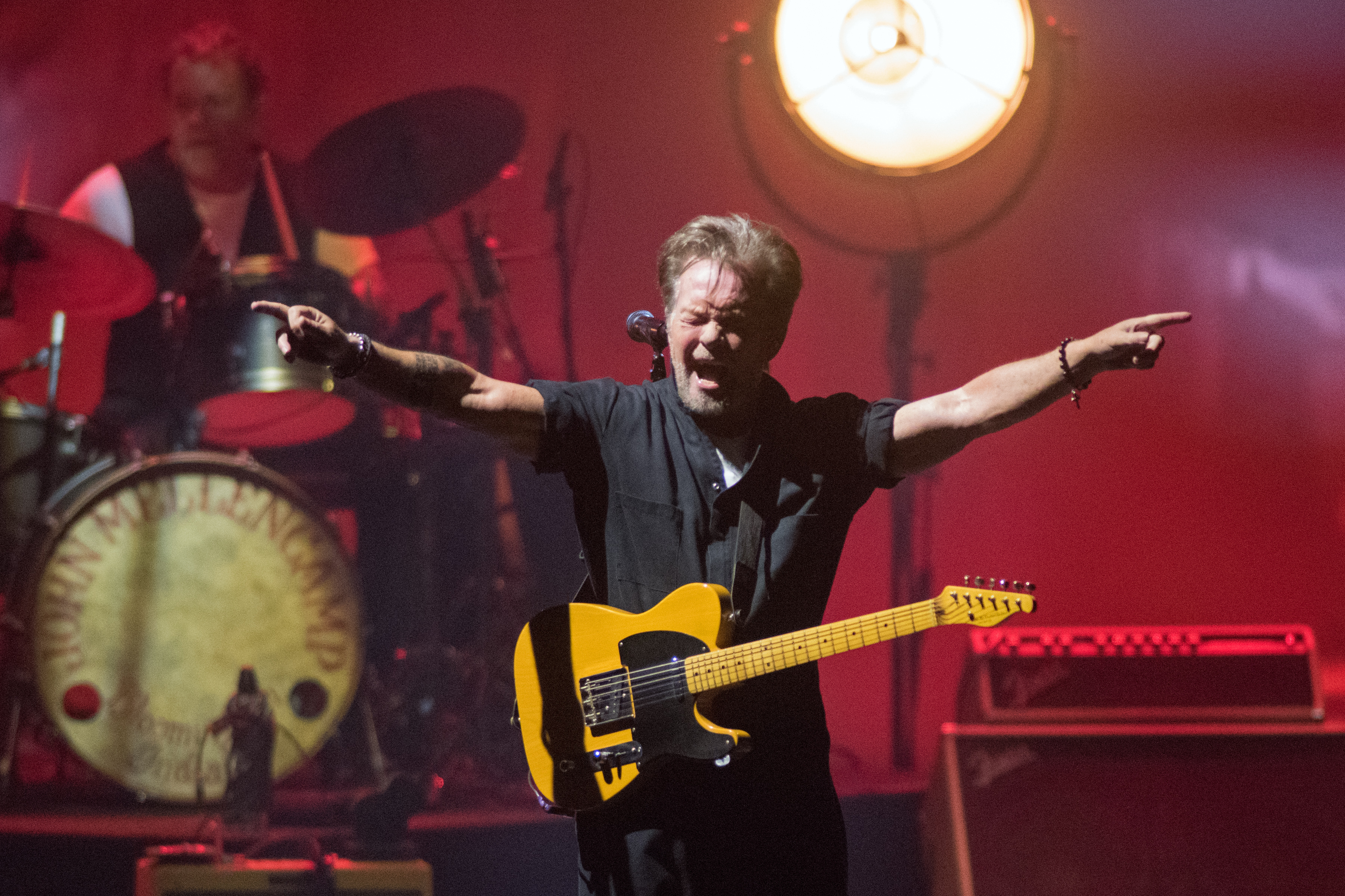 John Mellencamp sings Small Town before the start of the opening