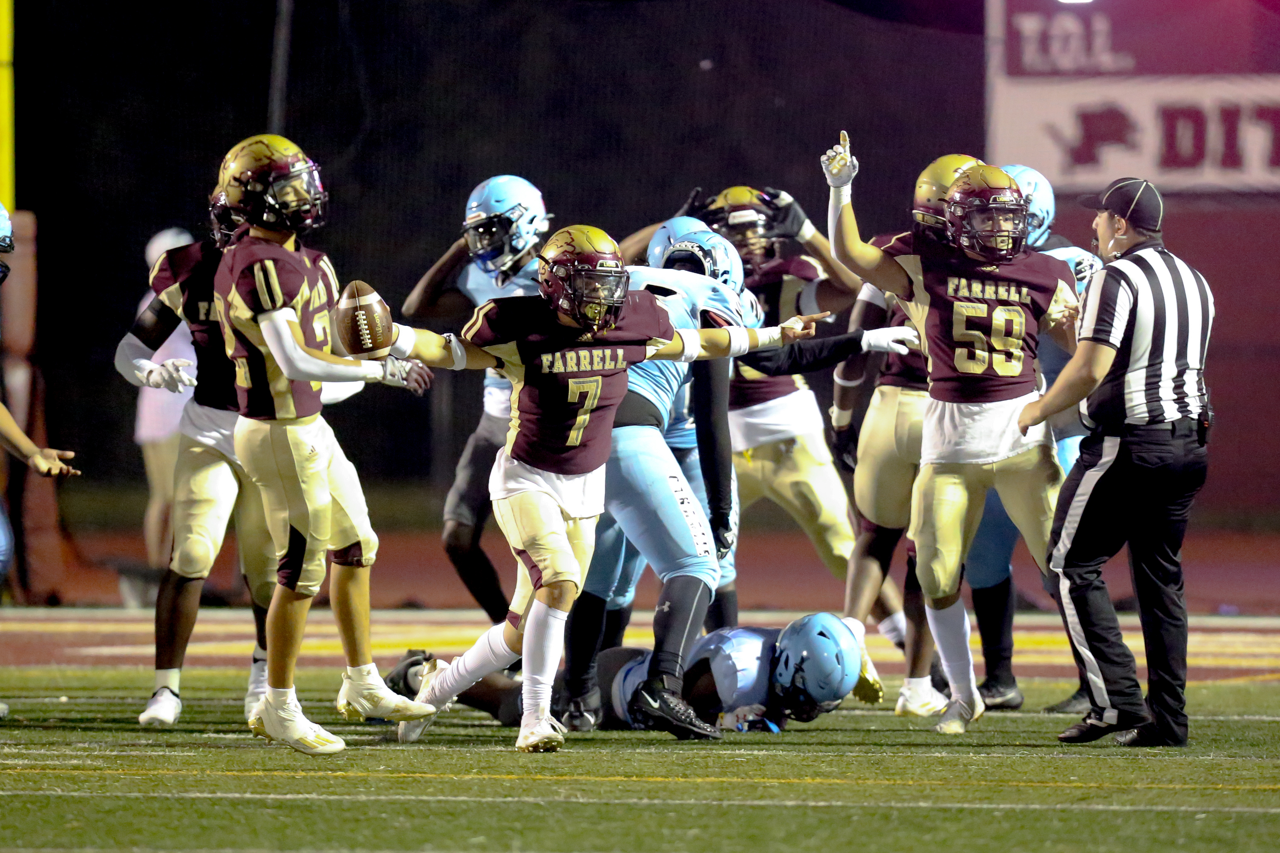 Monsignor Farrell's Gerard Sheehan celebrates a fumble recovery against Canarsie in non-league play at the Lions' Oakwood field on Friday, Sept. 15, 2023. (Staten Island Advance/Jason Paderon)