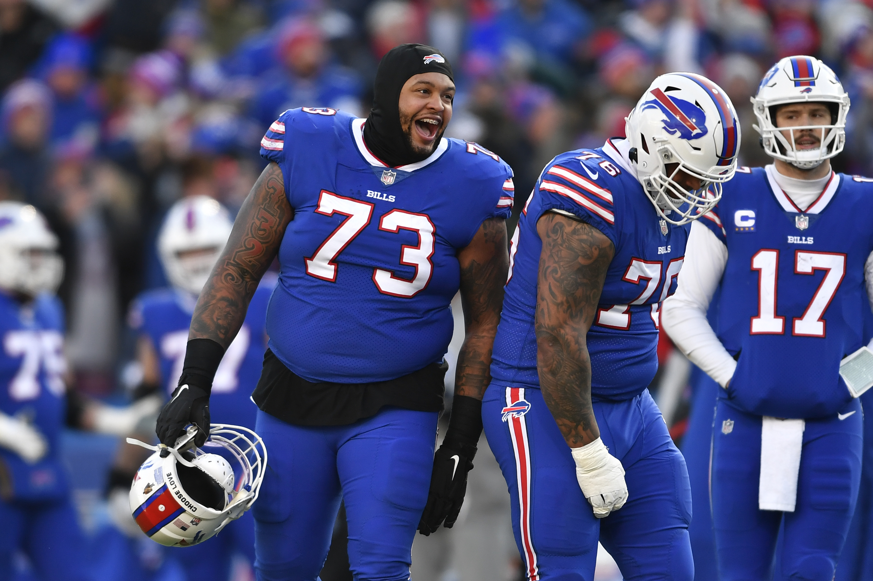 Buffalo Bills offensive tackle Dion Dawkins (73) lines-up during the first  half of an NFL wild-card playoff football game against the Miami Dolphins,  Sunday, Jan. 15, 2023, in Orchard Park, N.Y. (AP