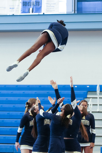West Genesee High School cheerleaders perform during the Cheerleading Section III Championship at Sandy Creek Central School District Saturday, November 6, 2021. Marilu Lopez Fretts | Contributing Photographer Marilu Lopez Fretts