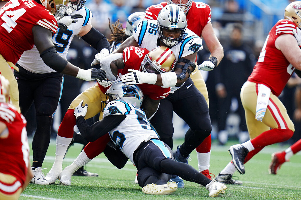 Carolina Panthers defensive tackle Derrick Brown (95) looks on