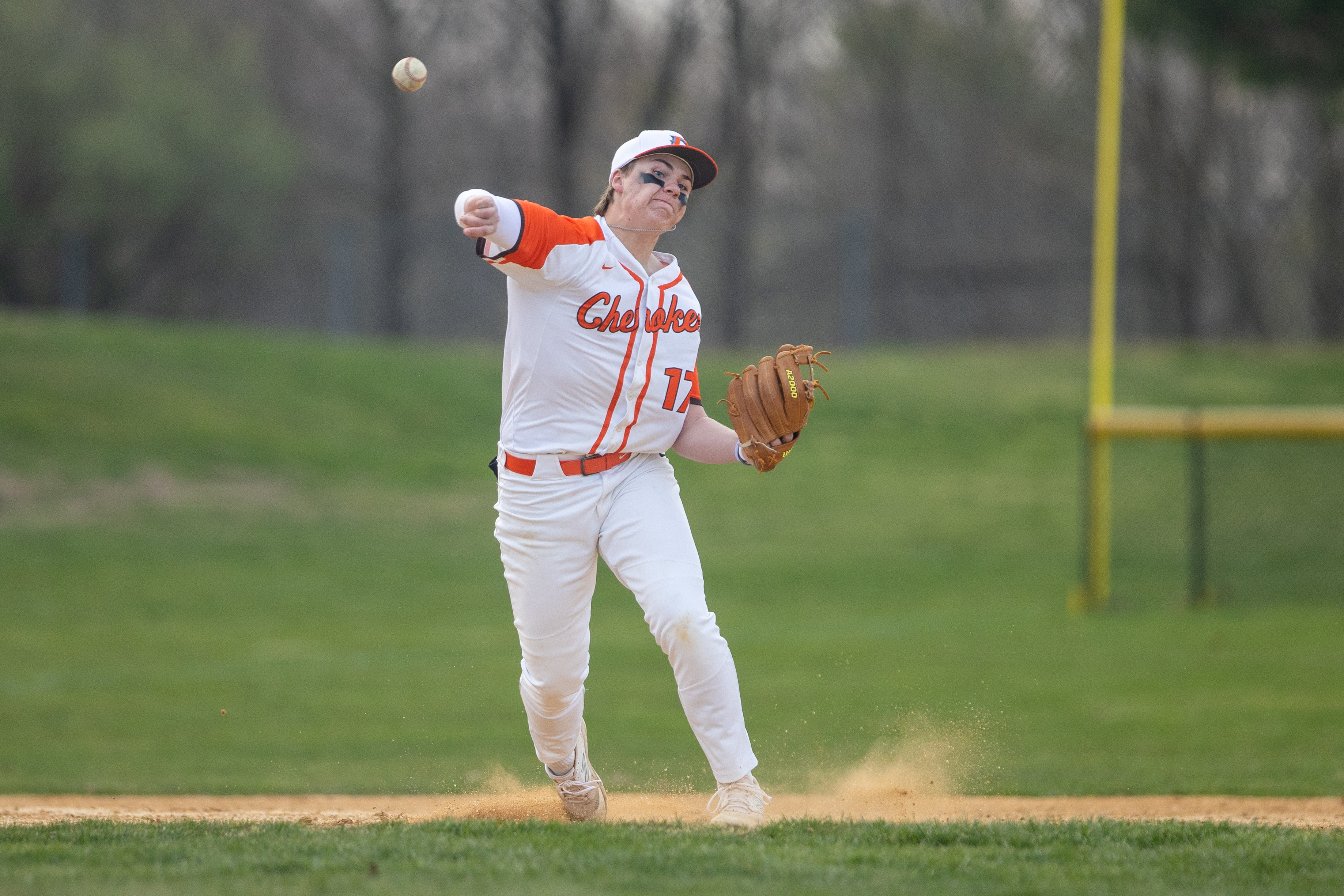 Brett Chiesa (17) of Cherokee, makes a play to first in Marlton, NJ on Monday, April 3, 2023.