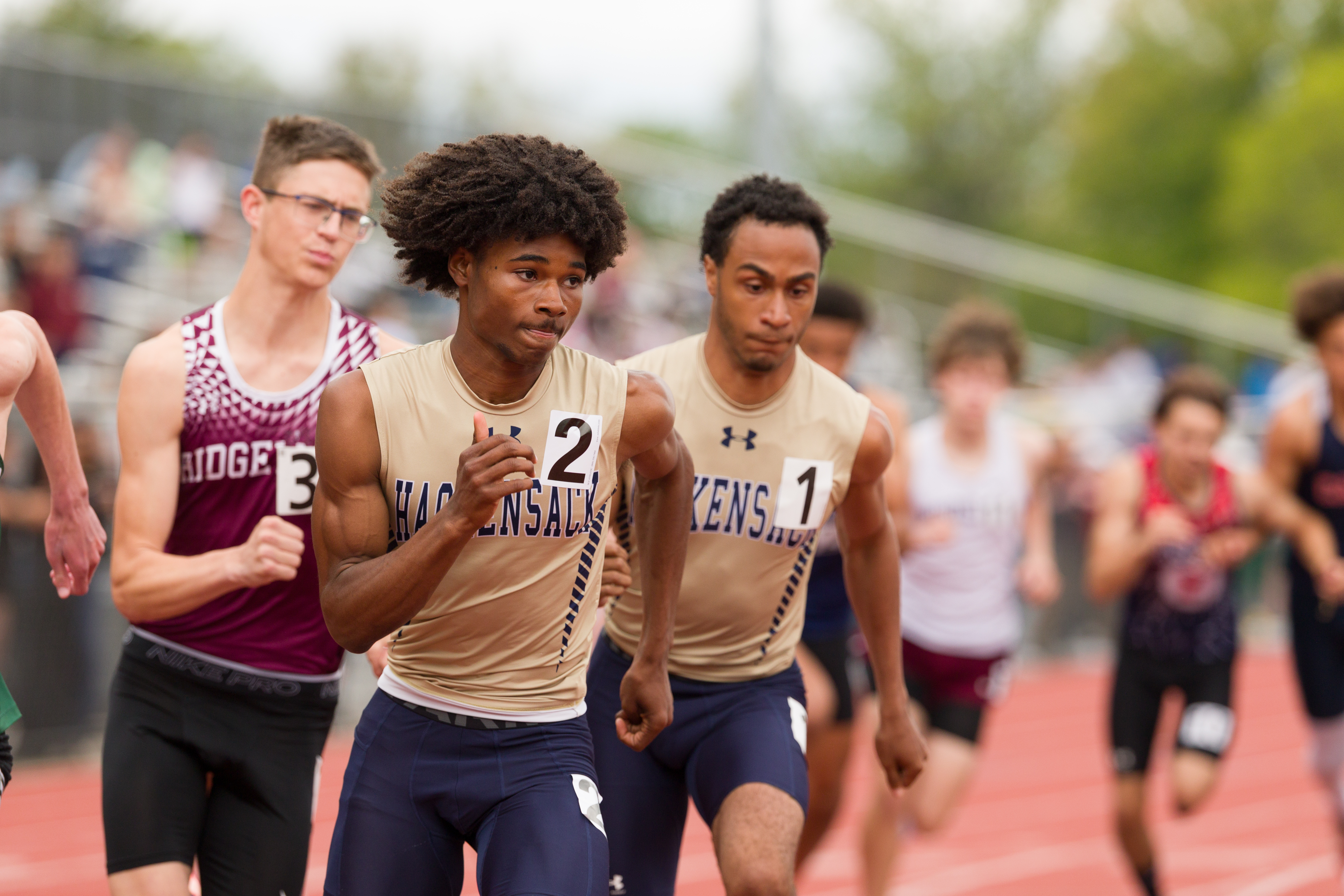Meet records, upsets and fast times lead top efforts from Day 1 of