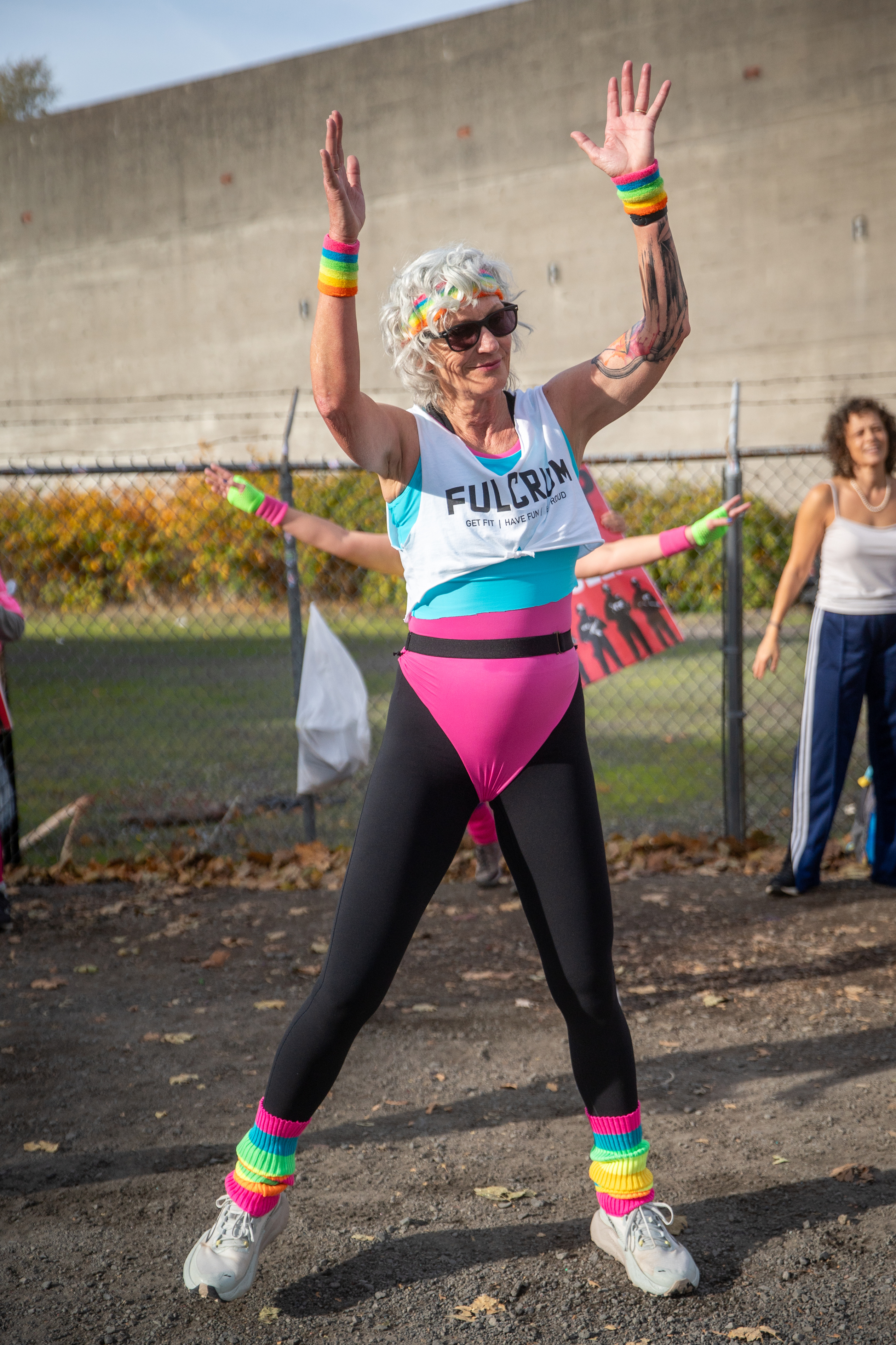 Participants in Fulcrum Fitness’s “Sweatin’ Out the Fascists” held an ’80s-aerobics peaceful protest outside the U.S. Immigration and Customs Enforcement (ICE) facility in South Portland on Sunday, Nov. 9, 2025, collecting donations for the Oregon Food Bank.