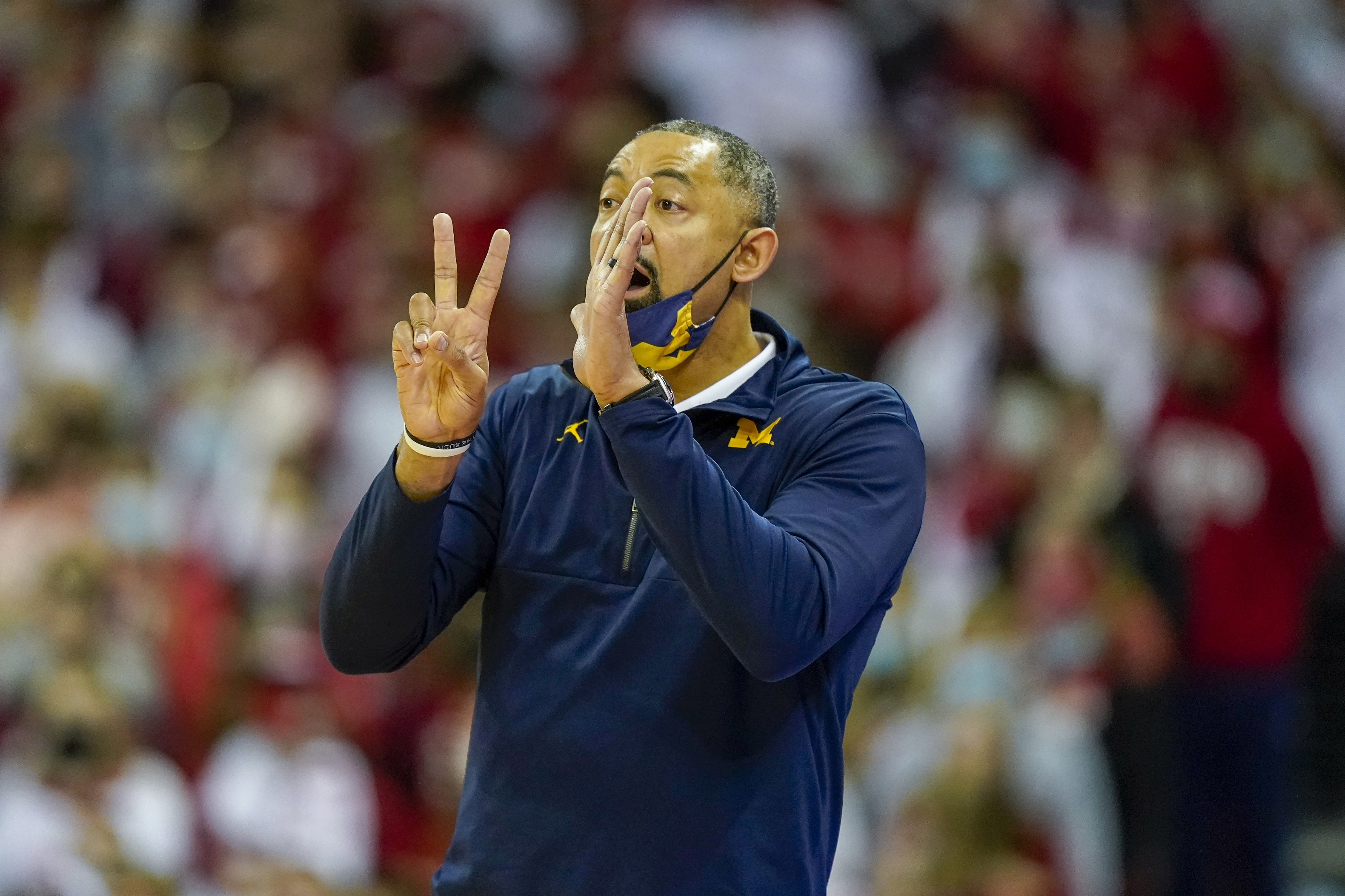 Video: Michigan basketball coach Juwan Howard strikes Wisconsin assistant  after game 