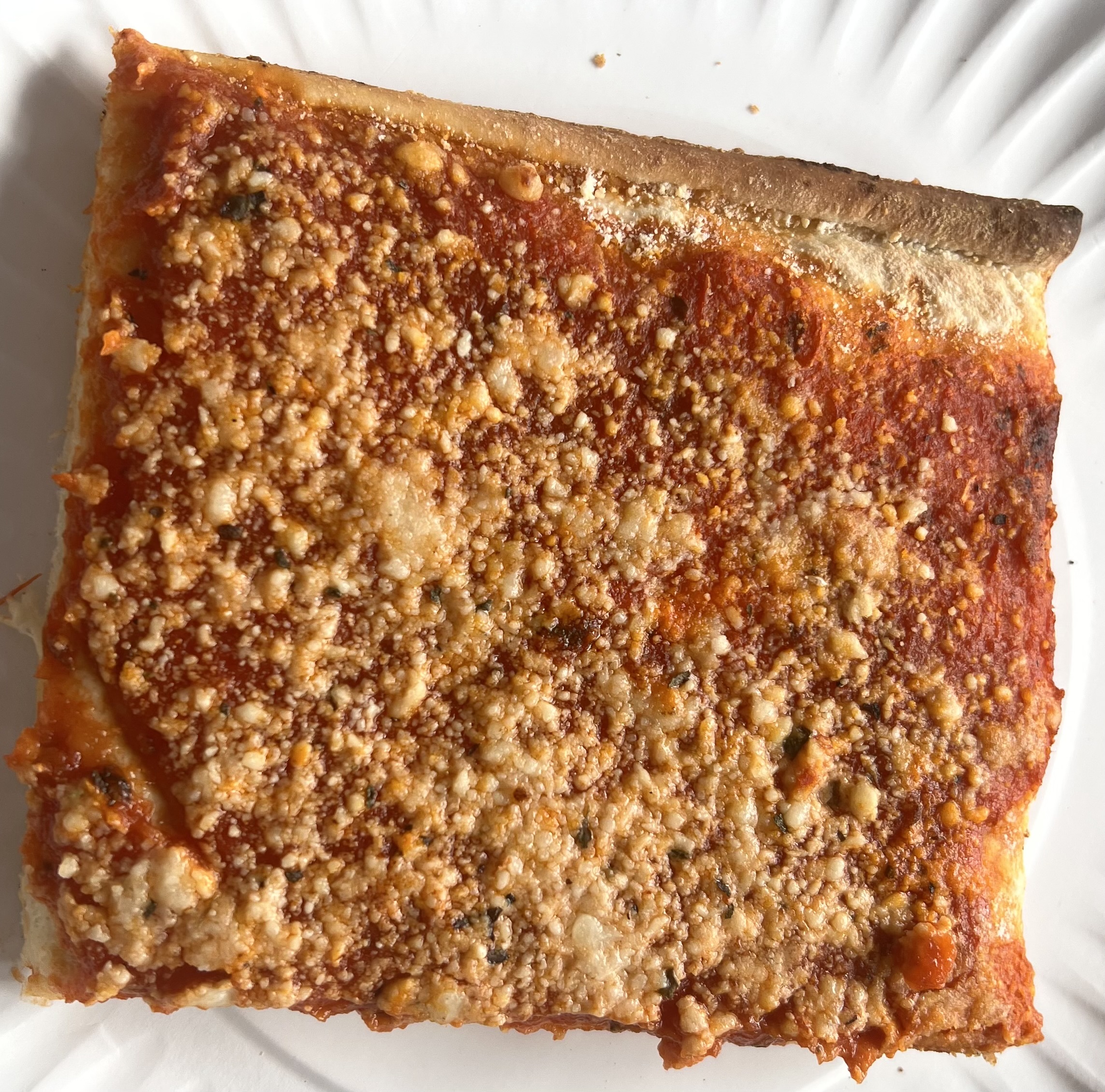 A slice of tomato pie from It's a Utica Thing at the New York State Fair on Aug. 23, 2023. (Rylee Kirk | rkirk@syracuse.com)