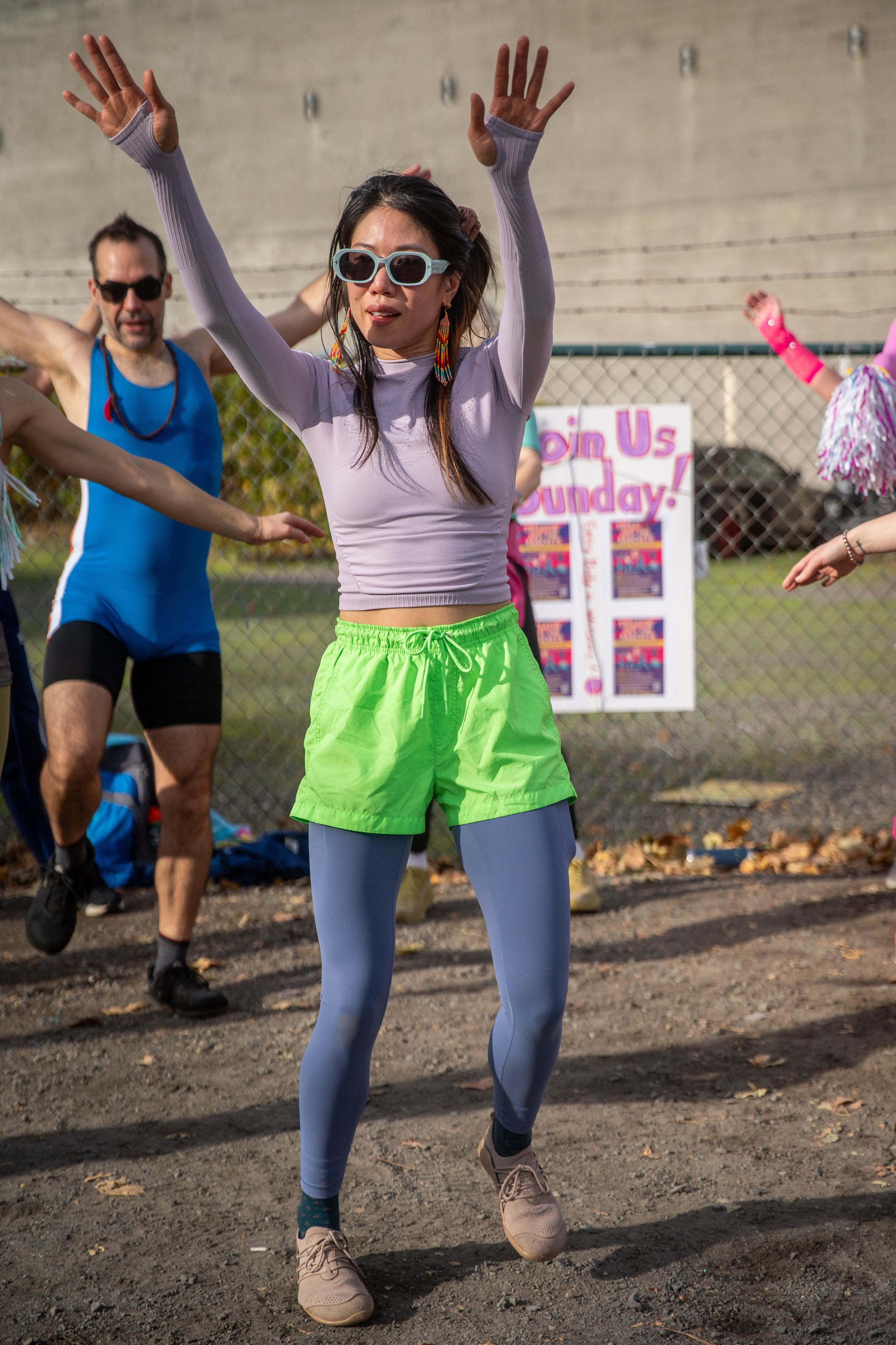 Participants in Fulcrum Fitness’s “Sweatin’ Out the Fascists” held an ’80s-aerobics peaceful protest outside the U.S. Immigration and Customs Enforcement (ICE) facility in South Portland on Sunday, Nov. 9, 2025, collecting donations for the Oregon Food Bank.