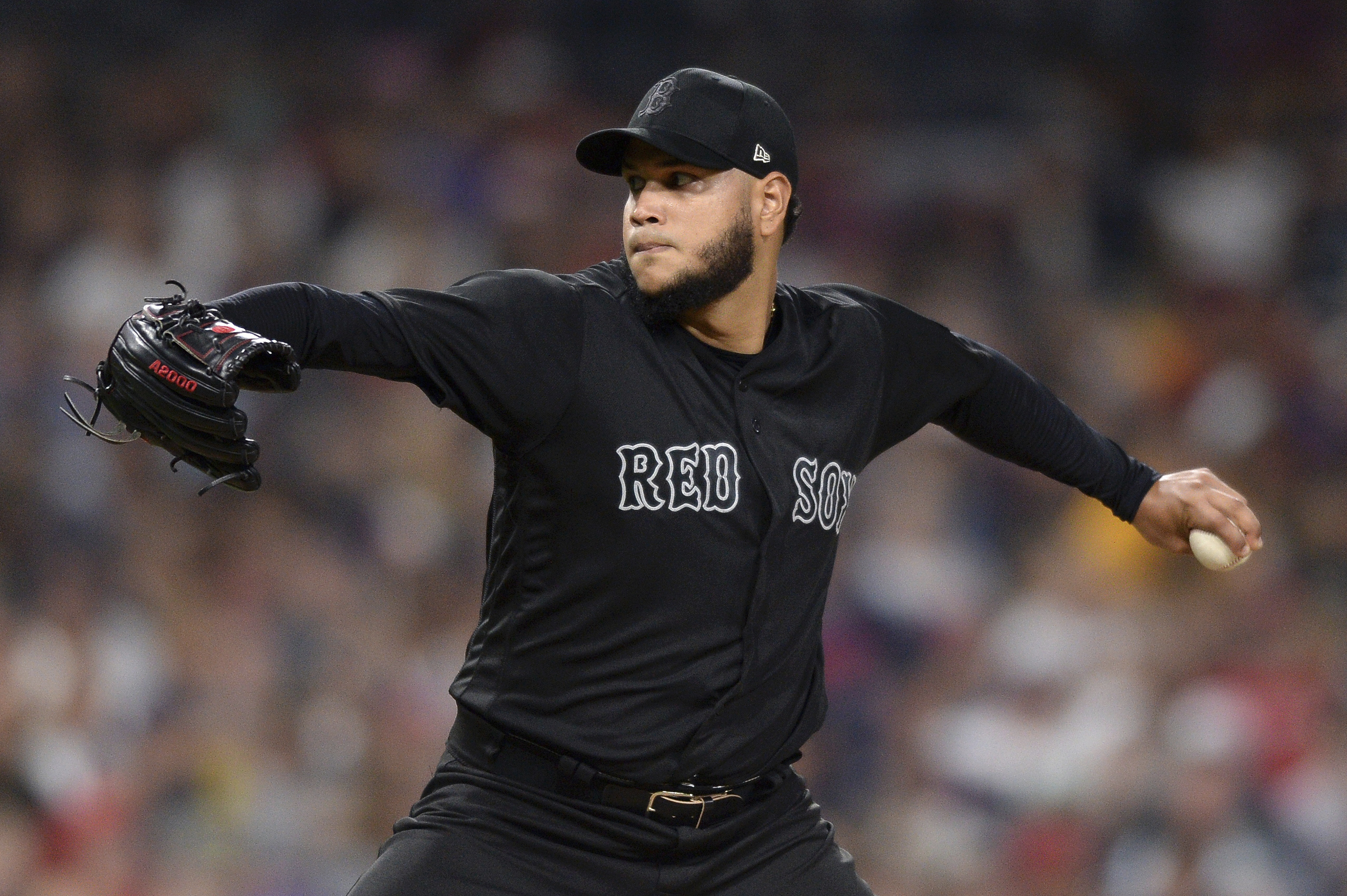 Boston Red Sox's Martin Perez makes cheese with hands at ranch