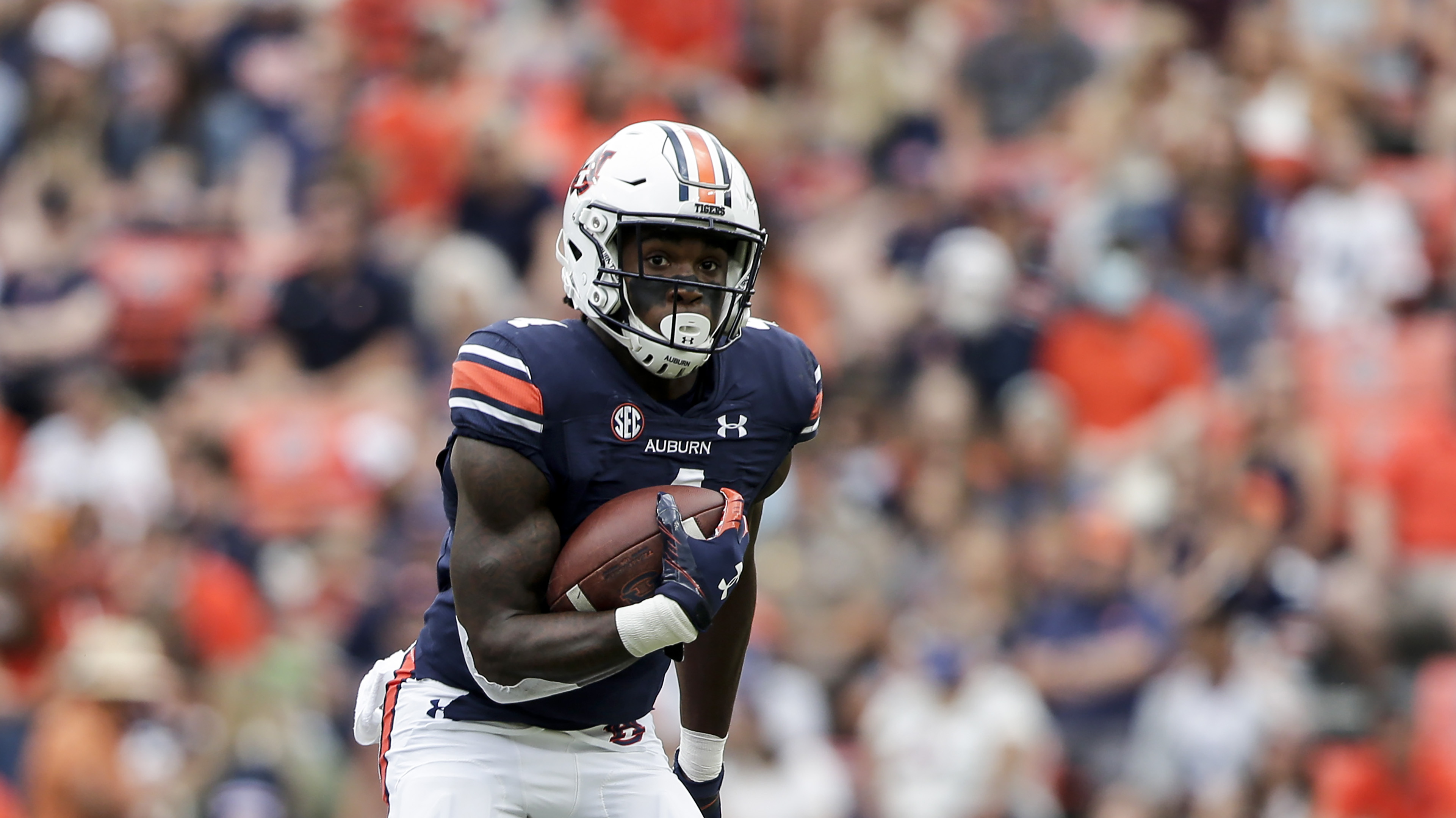 ESPN experts project Auburn to face American Athletic Conference