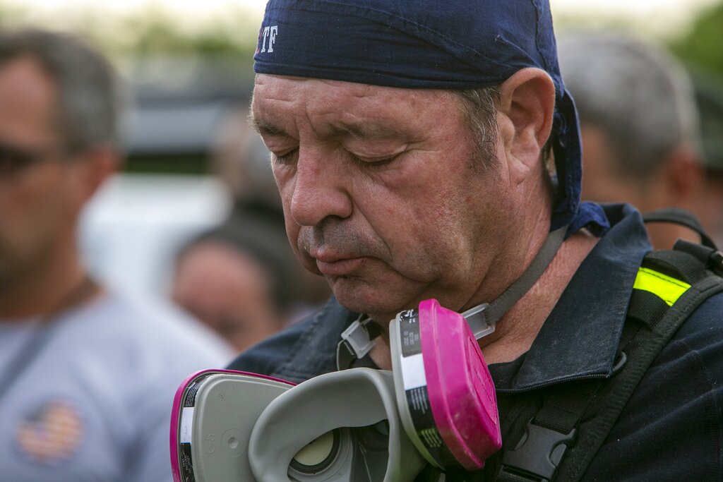 Recovery workers vow not to let up in Florida condo collapse ...