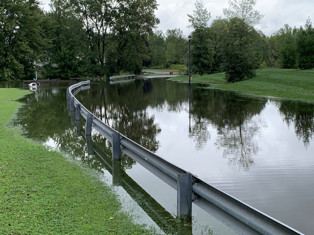 Willow Stream overflowed during heavy rains, causing the closure of Shoveler Lane, between Canvasback Drive and Pintail Path, in Clay due to flooding on Thursday, Aug. 19, 2021. Rick Moriarty