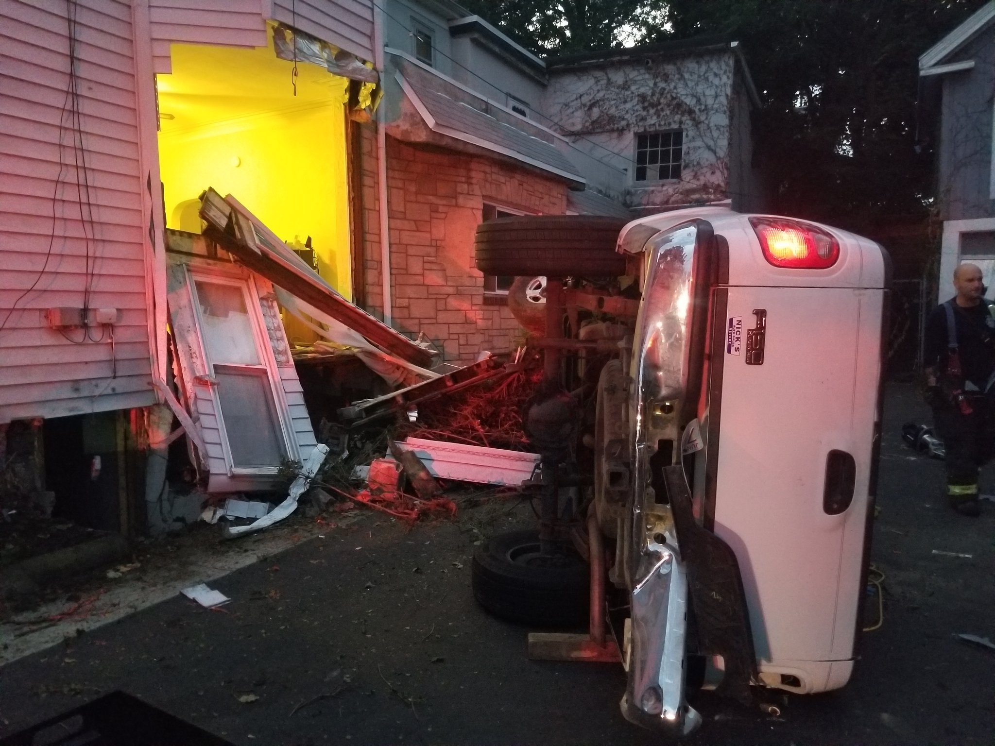 Car crashes into home in Chelsea, Massachusetts; Driver taken to hospital