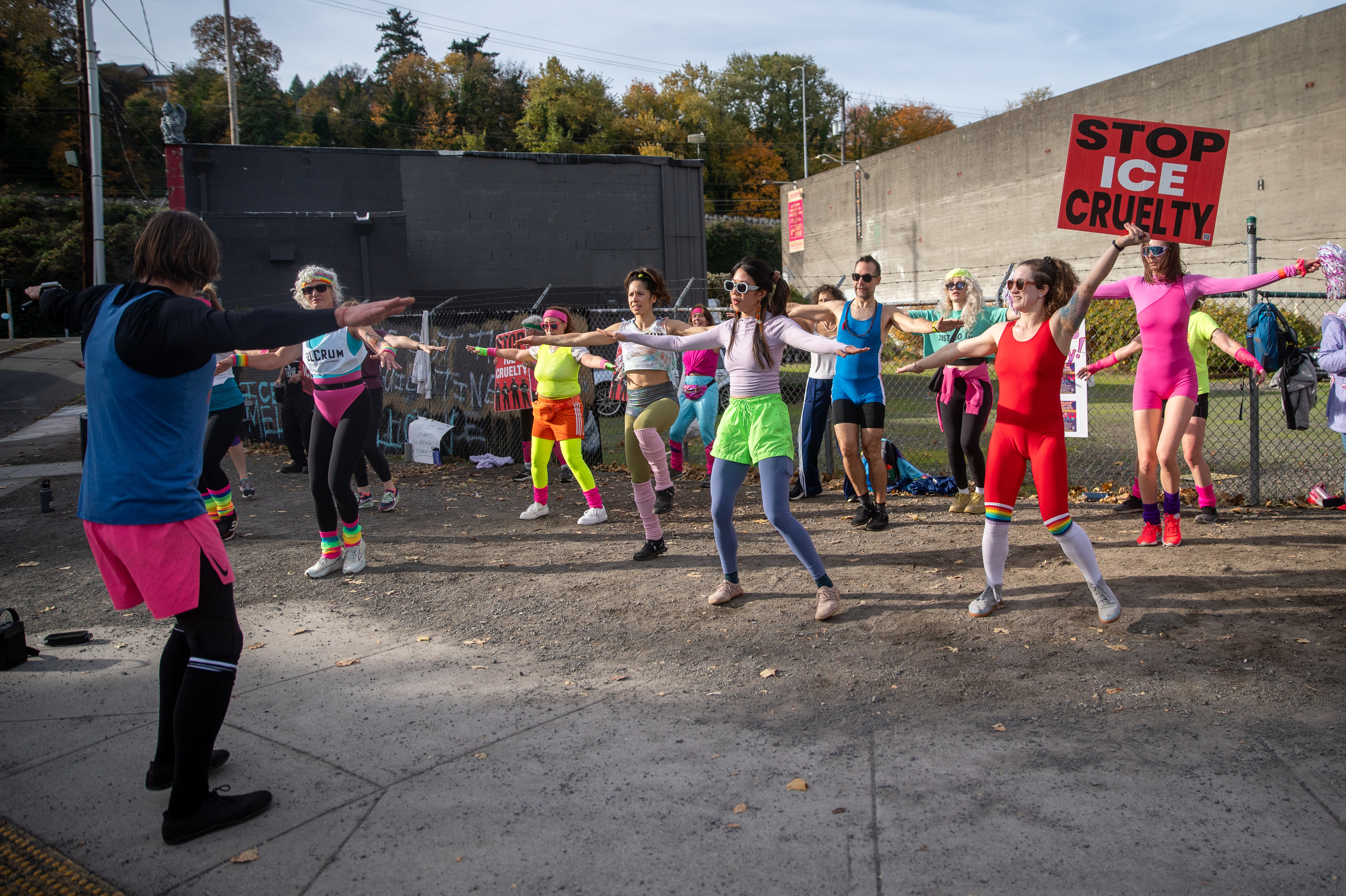 Participants in Fulcrum Fitness’s “Sweatin’ Out the Fascists” held an ’80s-aerobics peaceful protest outside the U.S. Immigration and Customs Enforcement (ICE) facility in South Portland on Sunday, Nov. 9, 2025, collecting donations for the Oregon Food Bank.