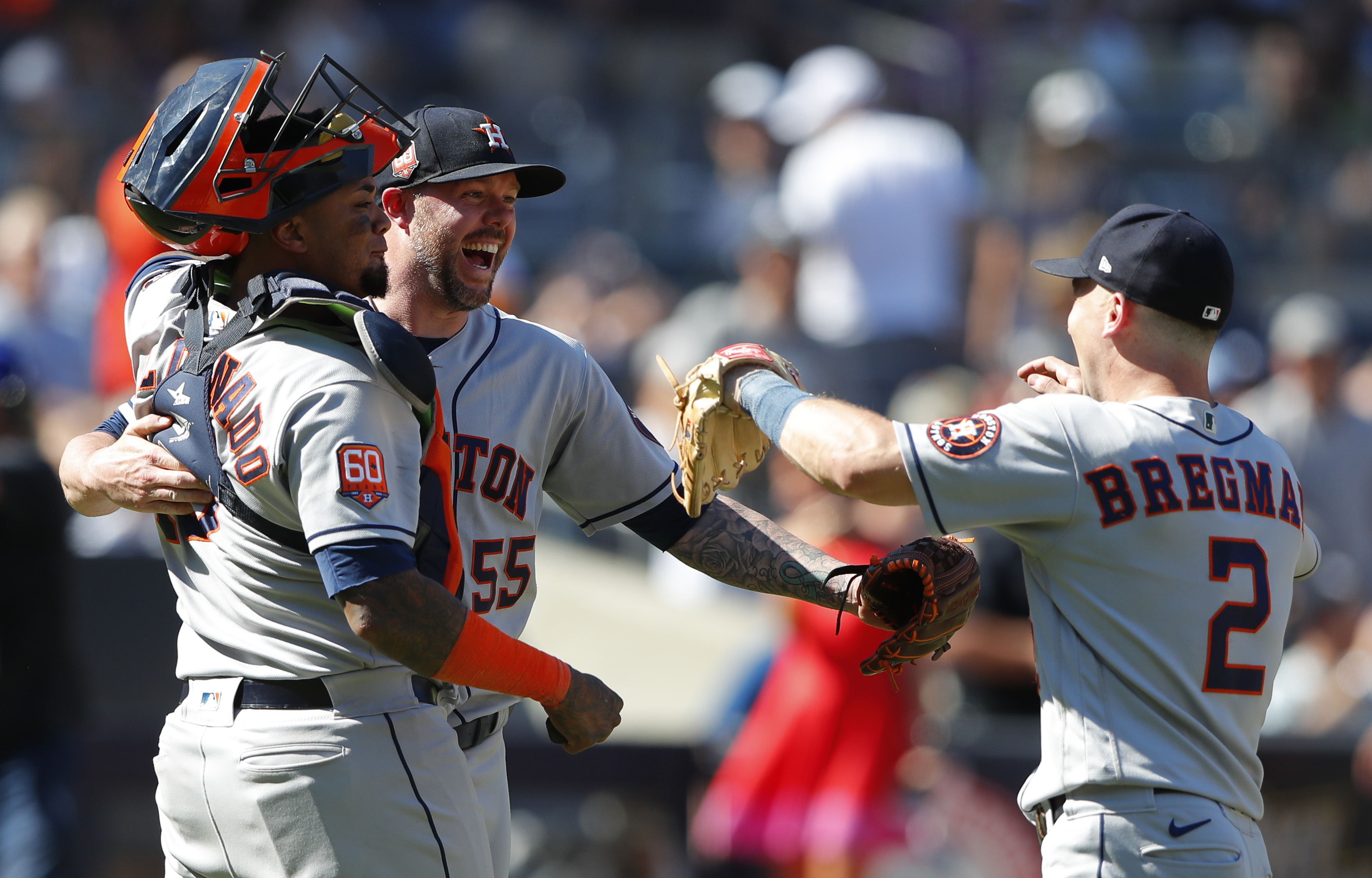 Houston Astros relief pitcher Ryan Pressly (55) celebrates getting