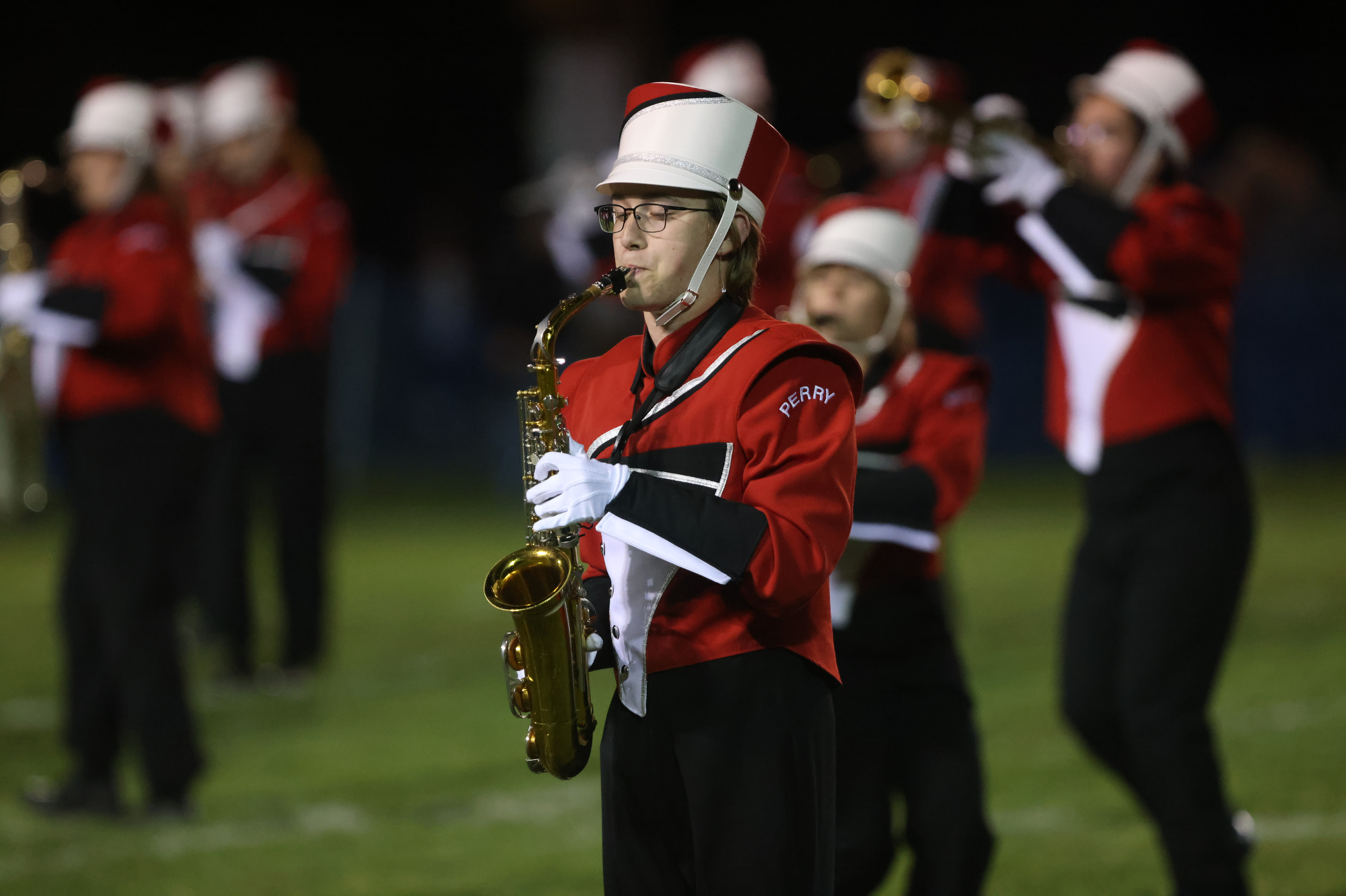 Perry Marching Band performs at halftime of the game at Kirtland