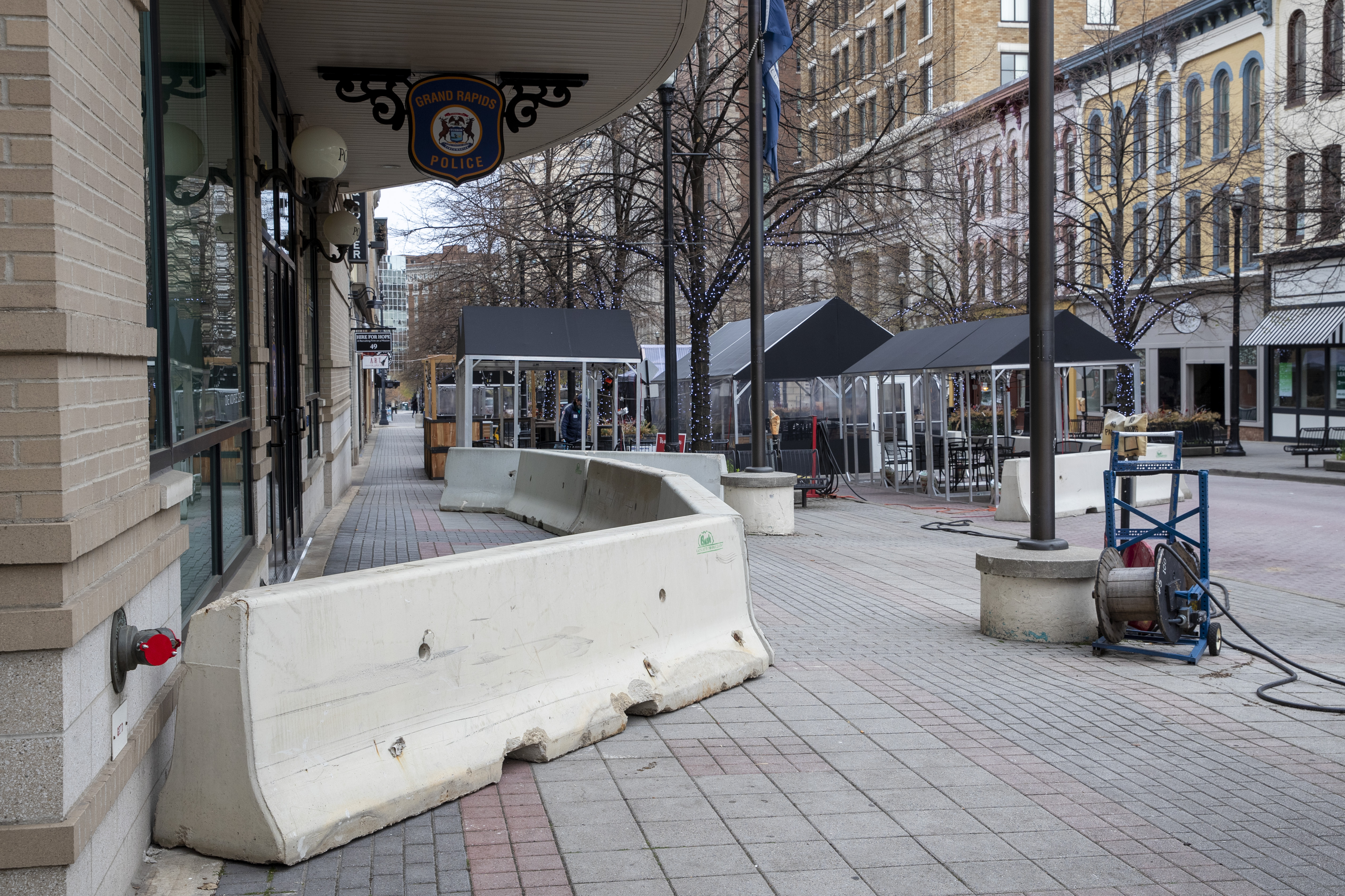 Barricades go up in downtown Grand Rapids, including around the Grand Rapids Police Department, on Tuesday, April 20, 2021, as a jury deliberates fate of Derek Chauvin in death of George Floyd. A riot on May 30, 2020, caused significant property damage in the aftermath of a peaceful protest following the death of Floyd in Minneapolis. (Cory Morse | MLive.com)
