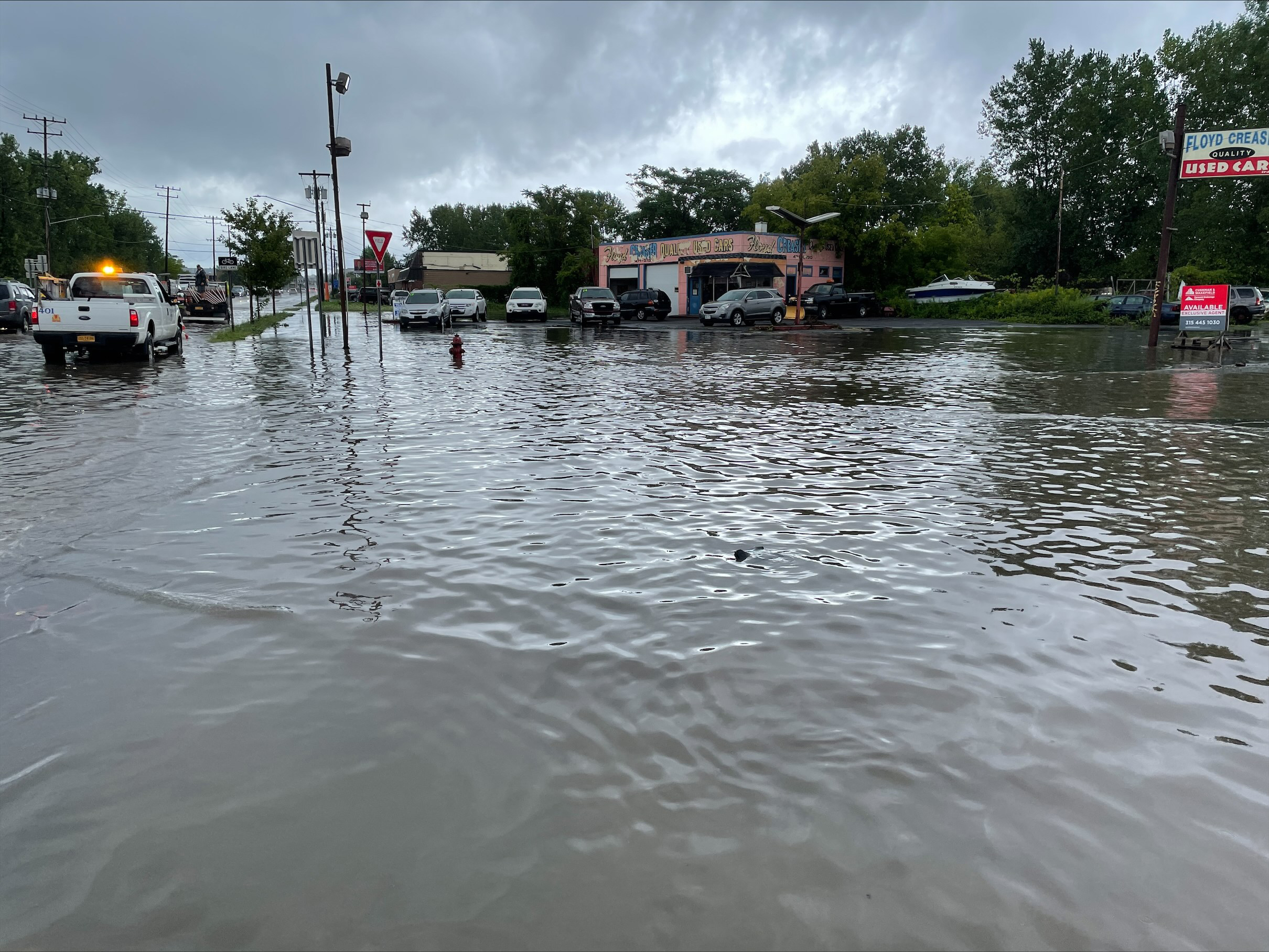 Portions of Hiawatha Boulevard and Spencer Street were flooded Thursday, Aug. 19. 2021, after steady rain continued in Central New York.