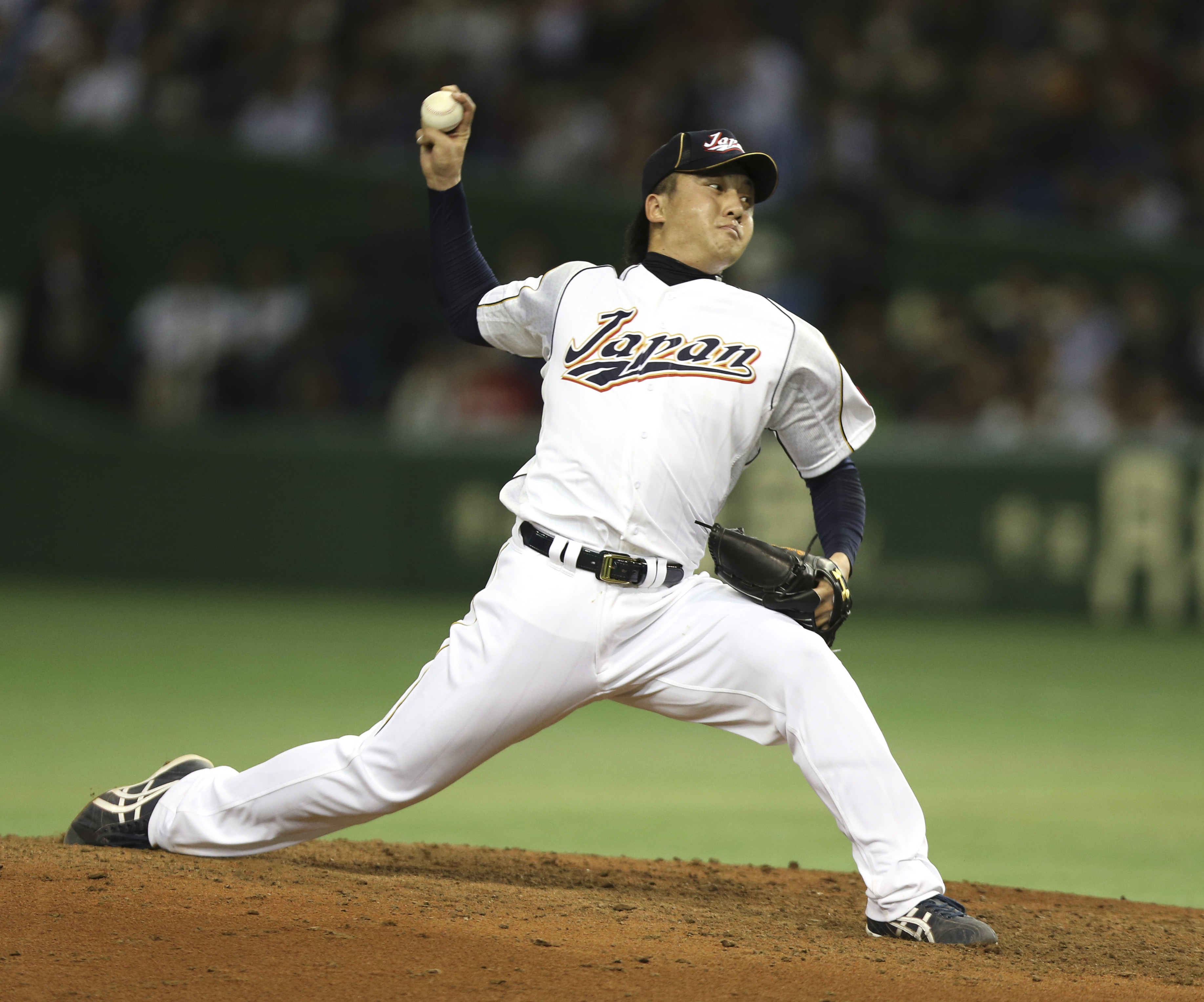 Hirokazu Sawamura of the Boston Red Sox pitches in a baseball game