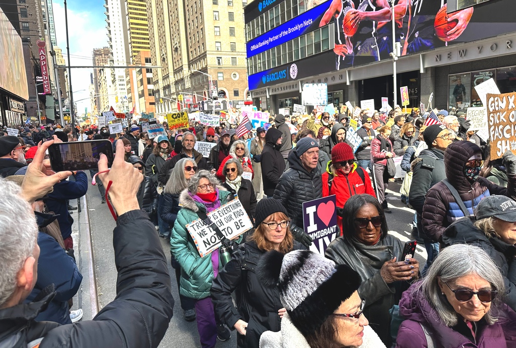 Photos: Tens of thousands march through Times Square in ‘No Kings ...