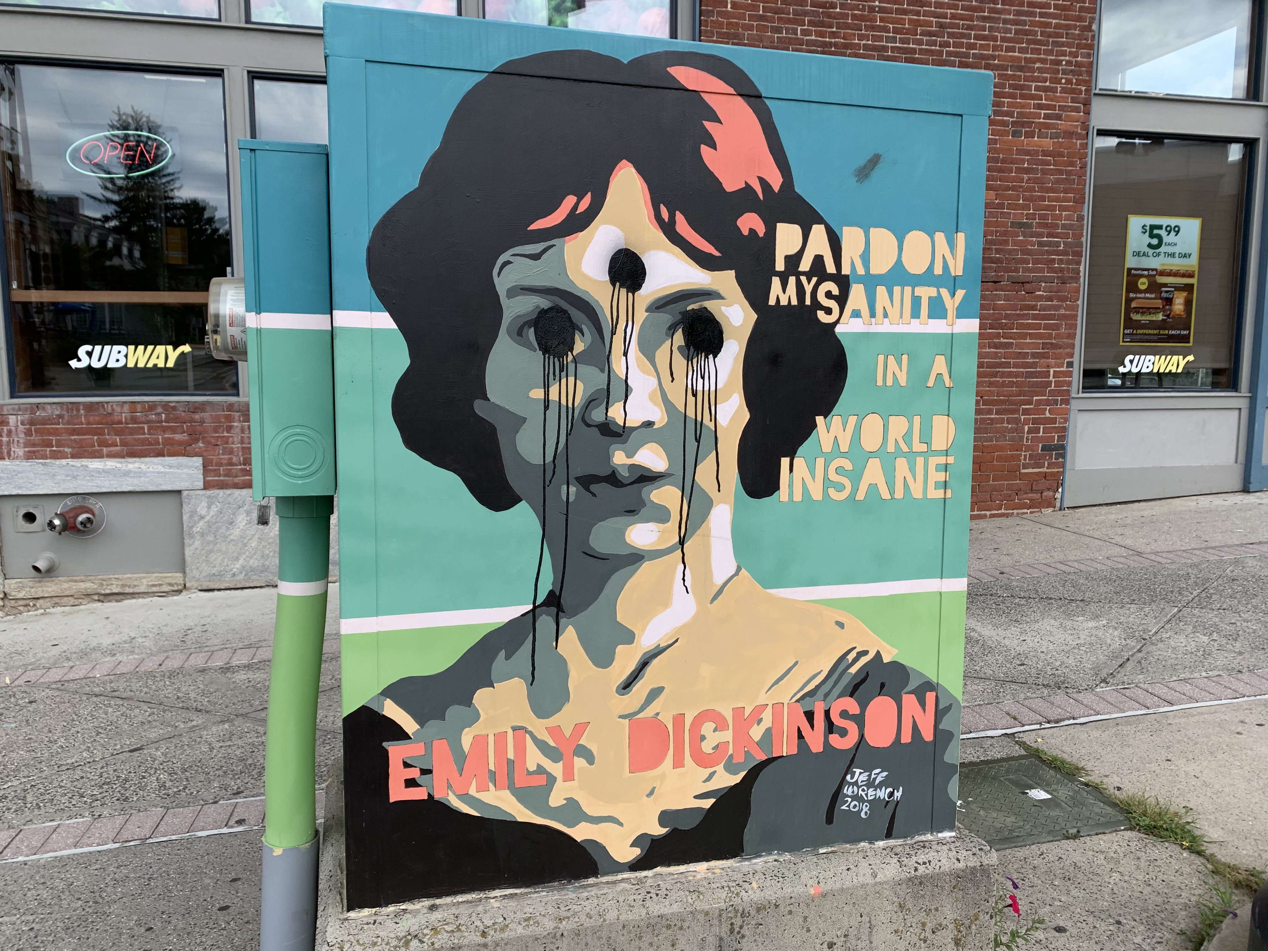 Someone painted bullet holes on face of Emily Dickinson in