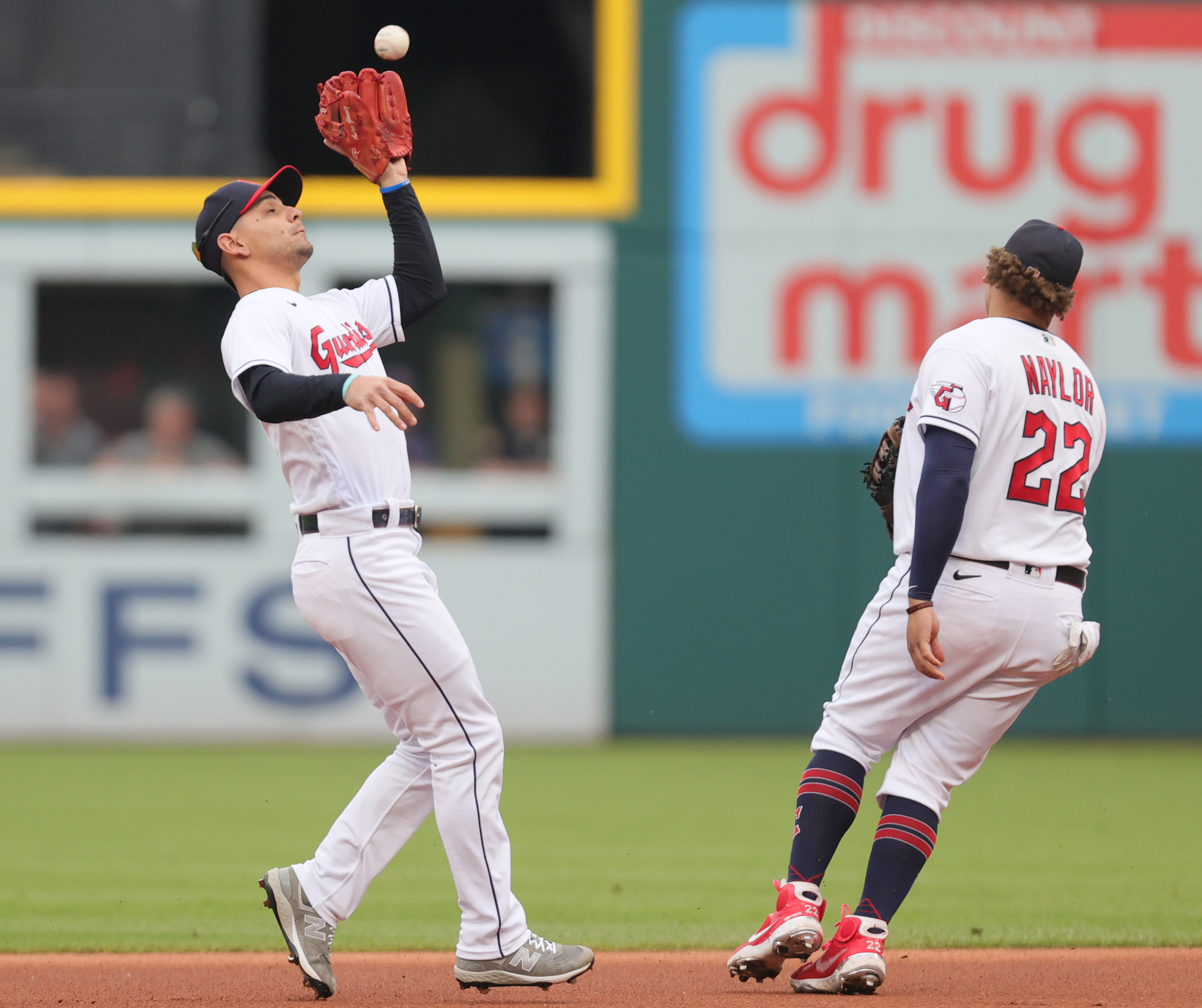 Cleveland Indians shortstop Andres Gimenez catches a popup for an out