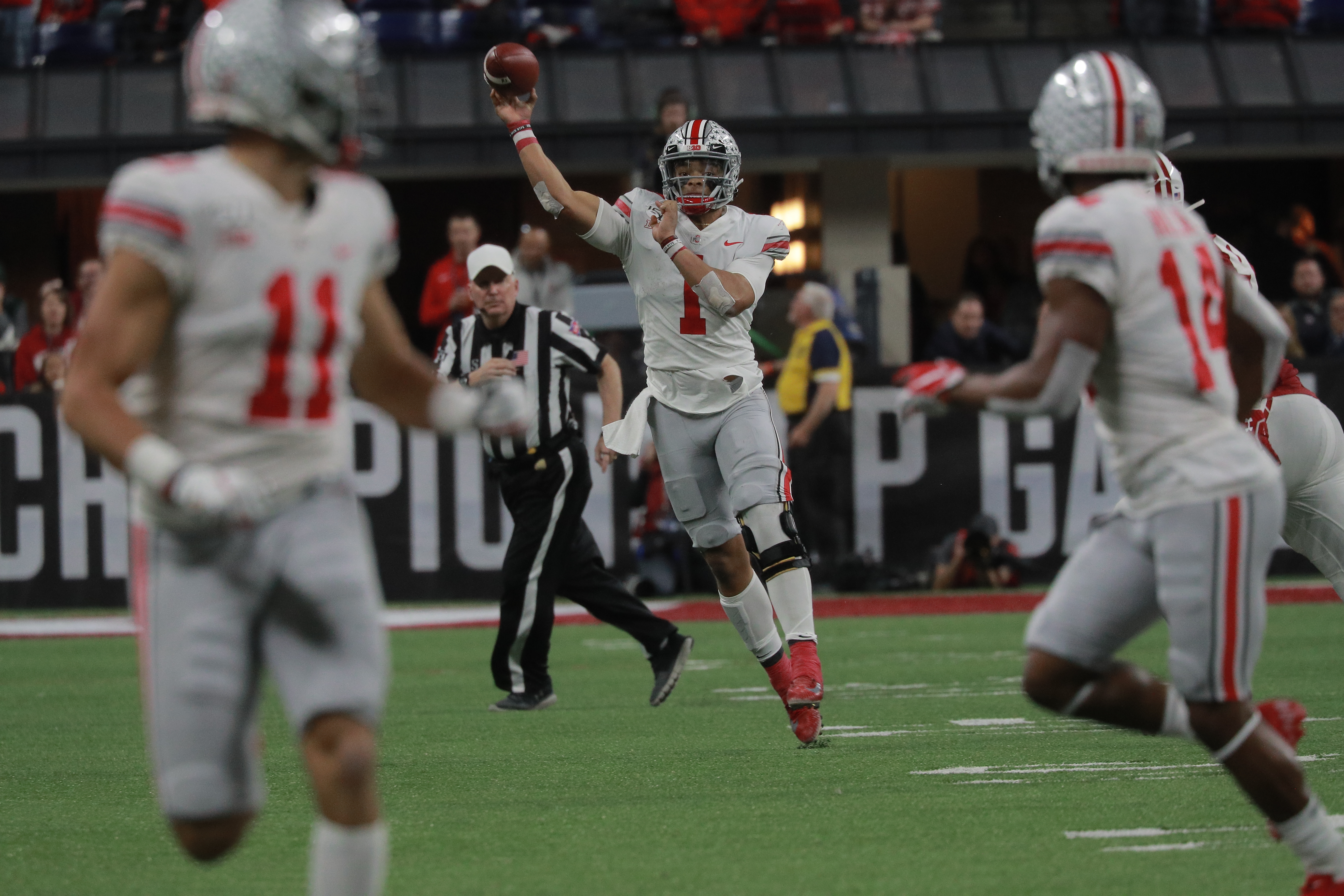 Ohio State's Justin Fields, Tommy Togiai honored by Big Ten