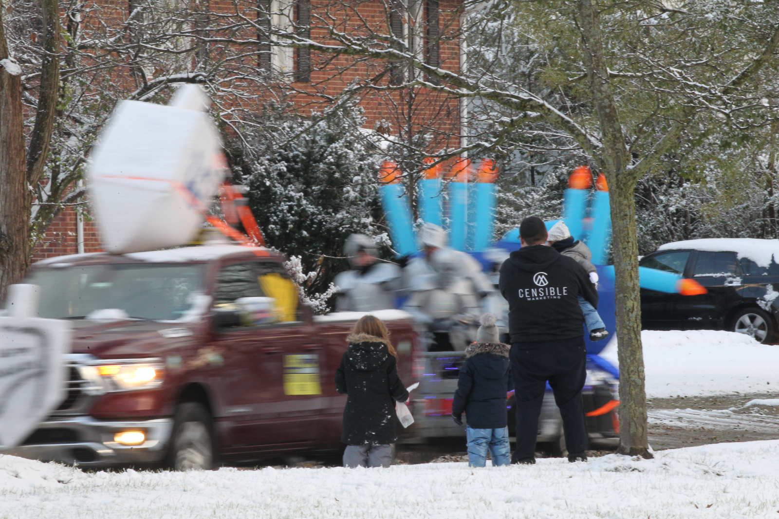 Menorahtopped cars parade through Cleveland eastern suburbs