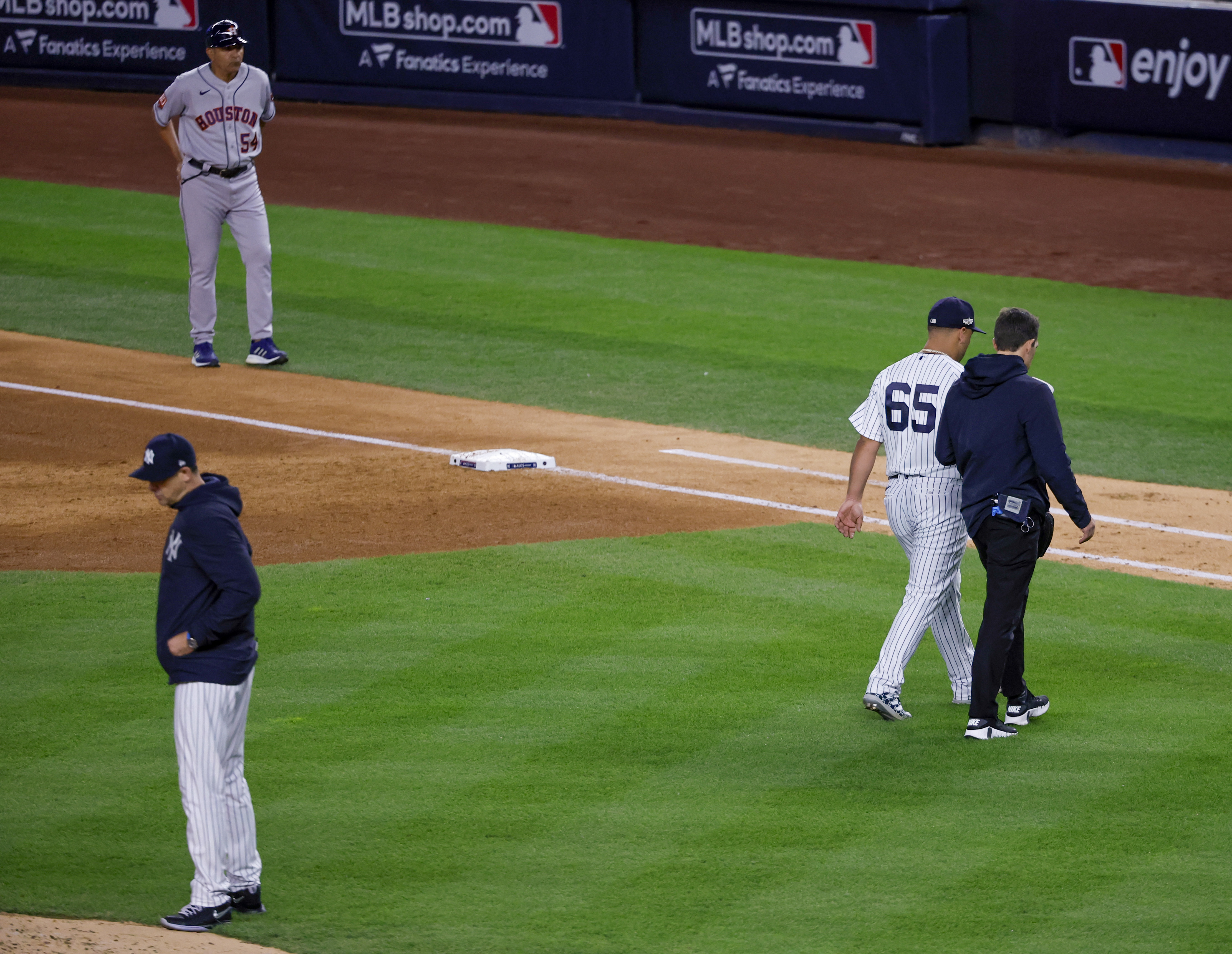 LOOK: Astros players use brooms in locker room to celebrate sweep of Yankees  in ALCS 