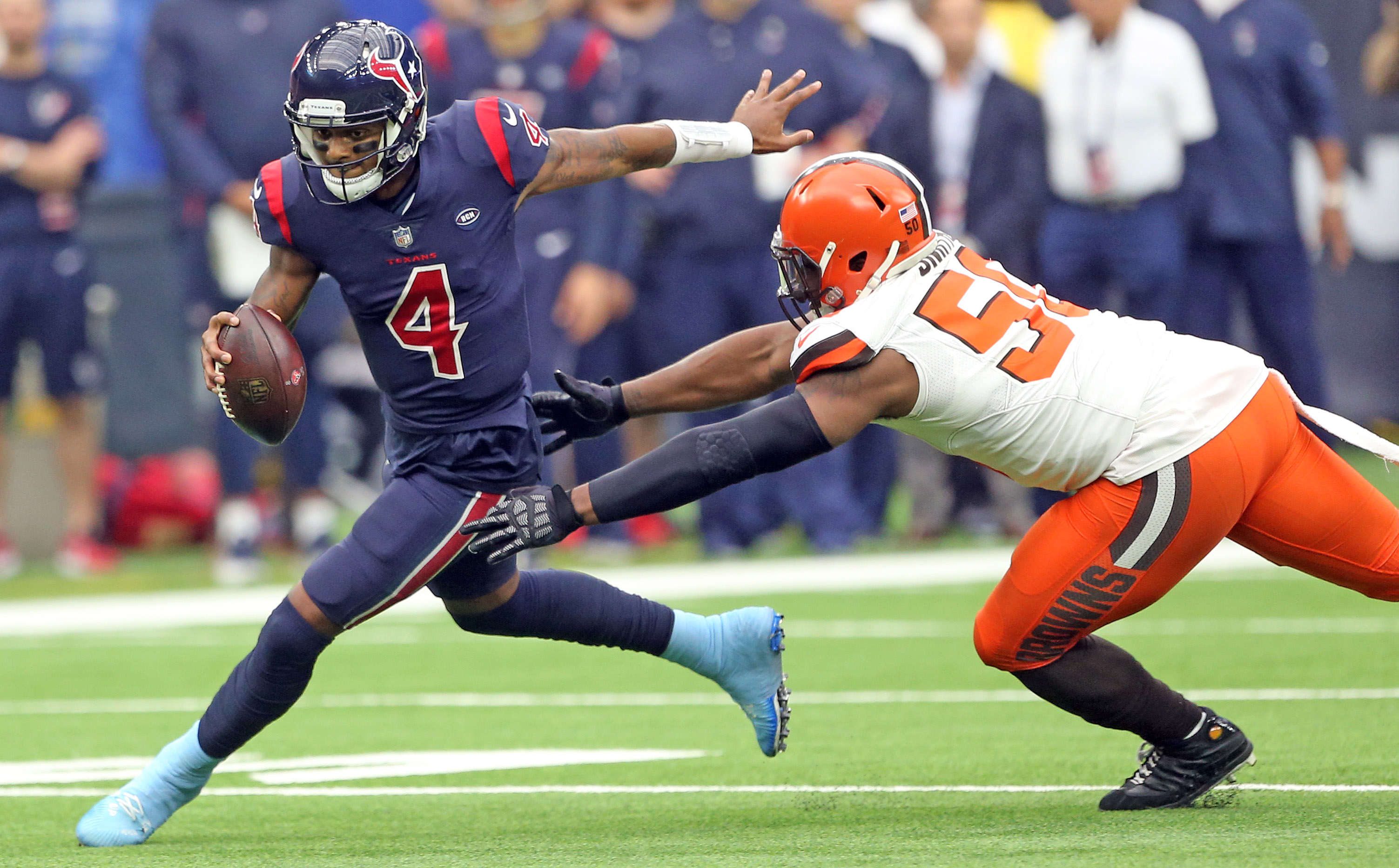 Cleveland Browns defensive end Chris Smith (50) stands with