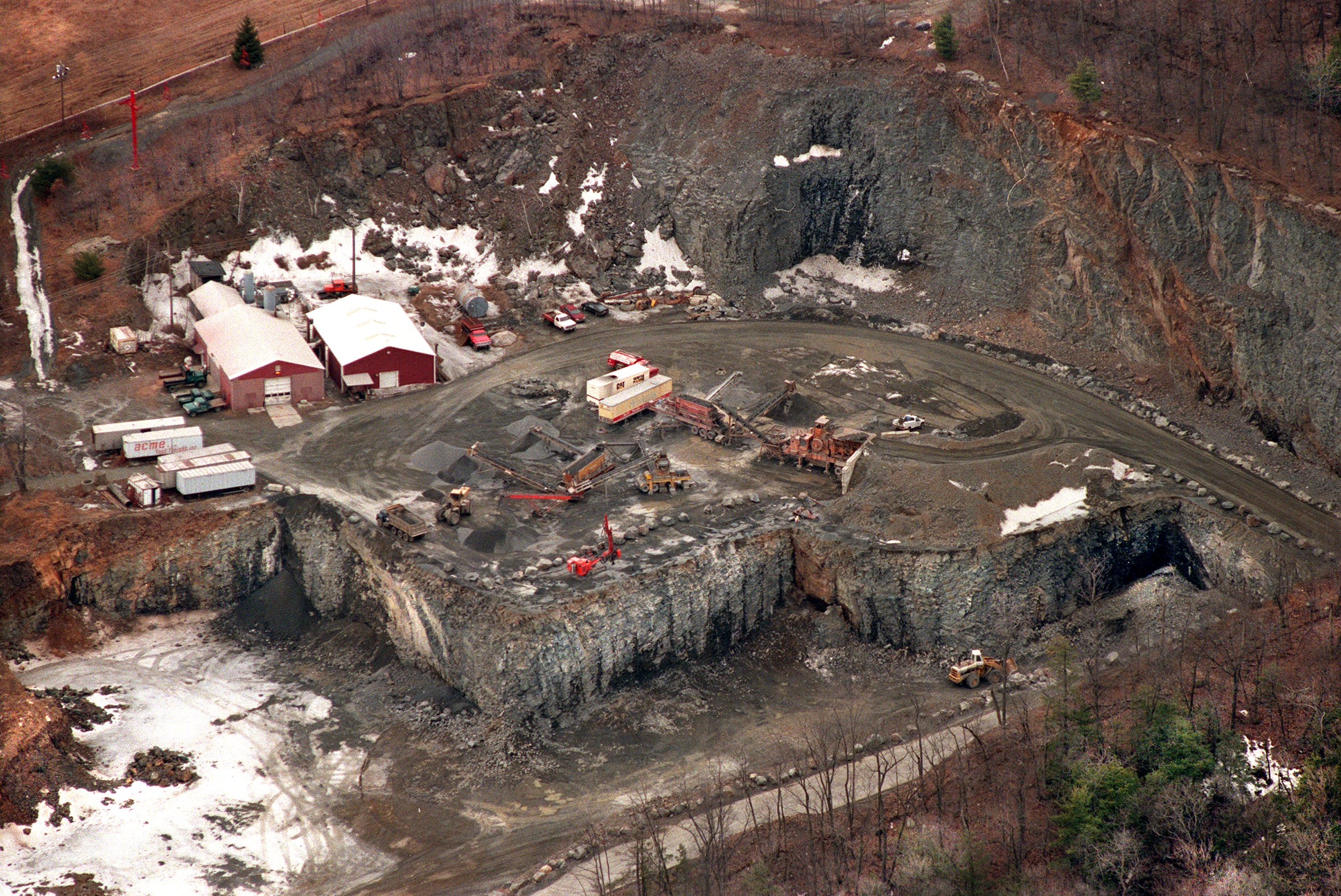 A Republican photo from 1999 showing the Mt. Tom quarry in operation.  When it closed for good in 2012, the hole would be much bigger.