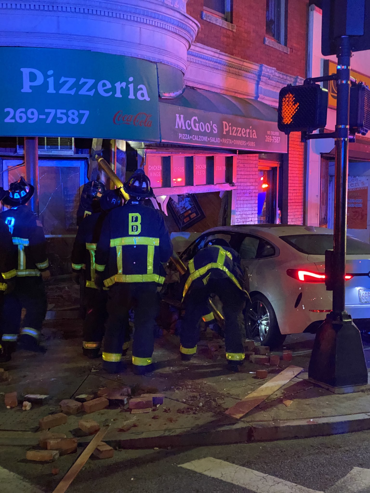 Car crashes into South Boston pizza shop, leaving driver injured and 6 ...