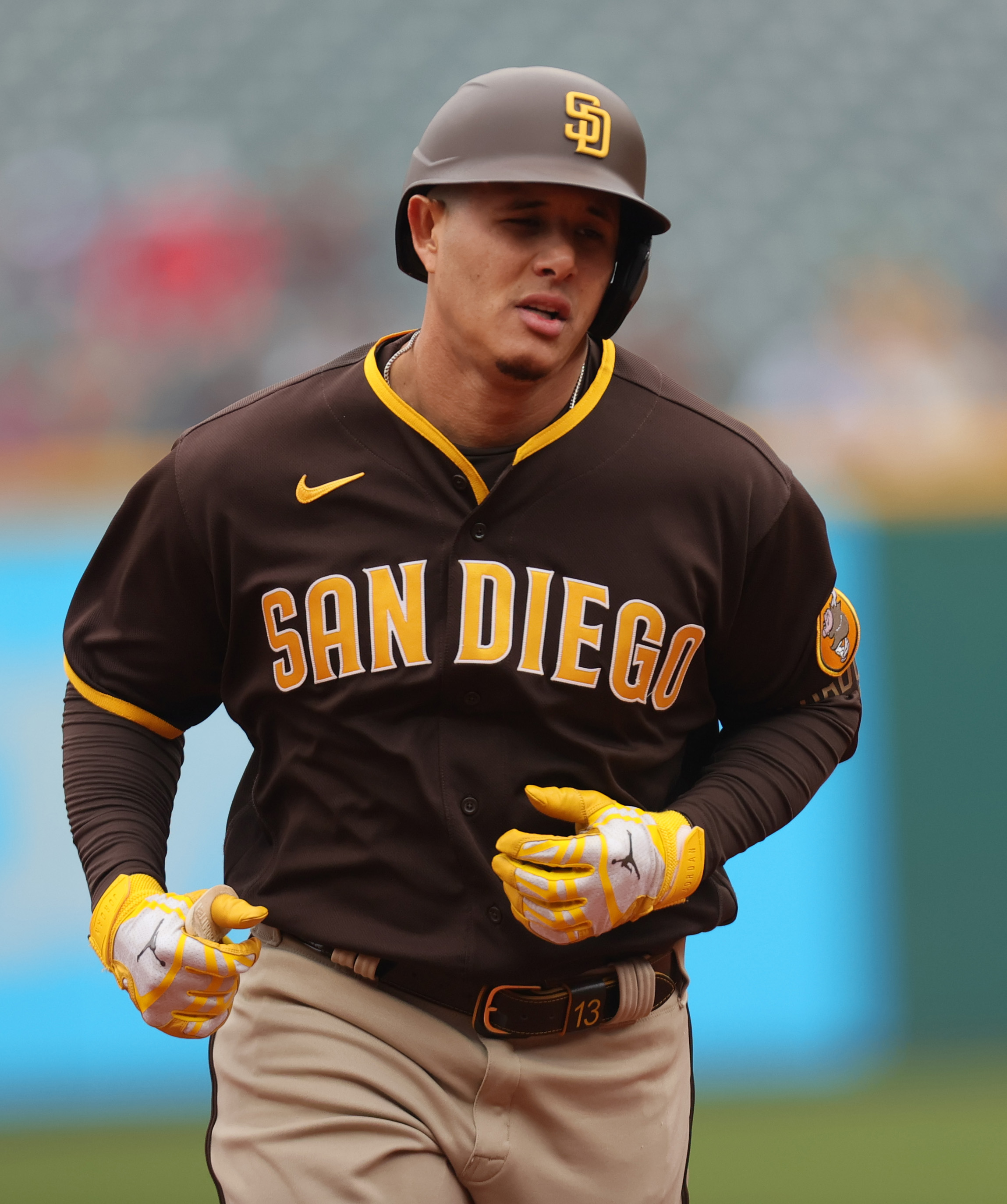 Manny Machado of the San Diego Padres rounds the bases after