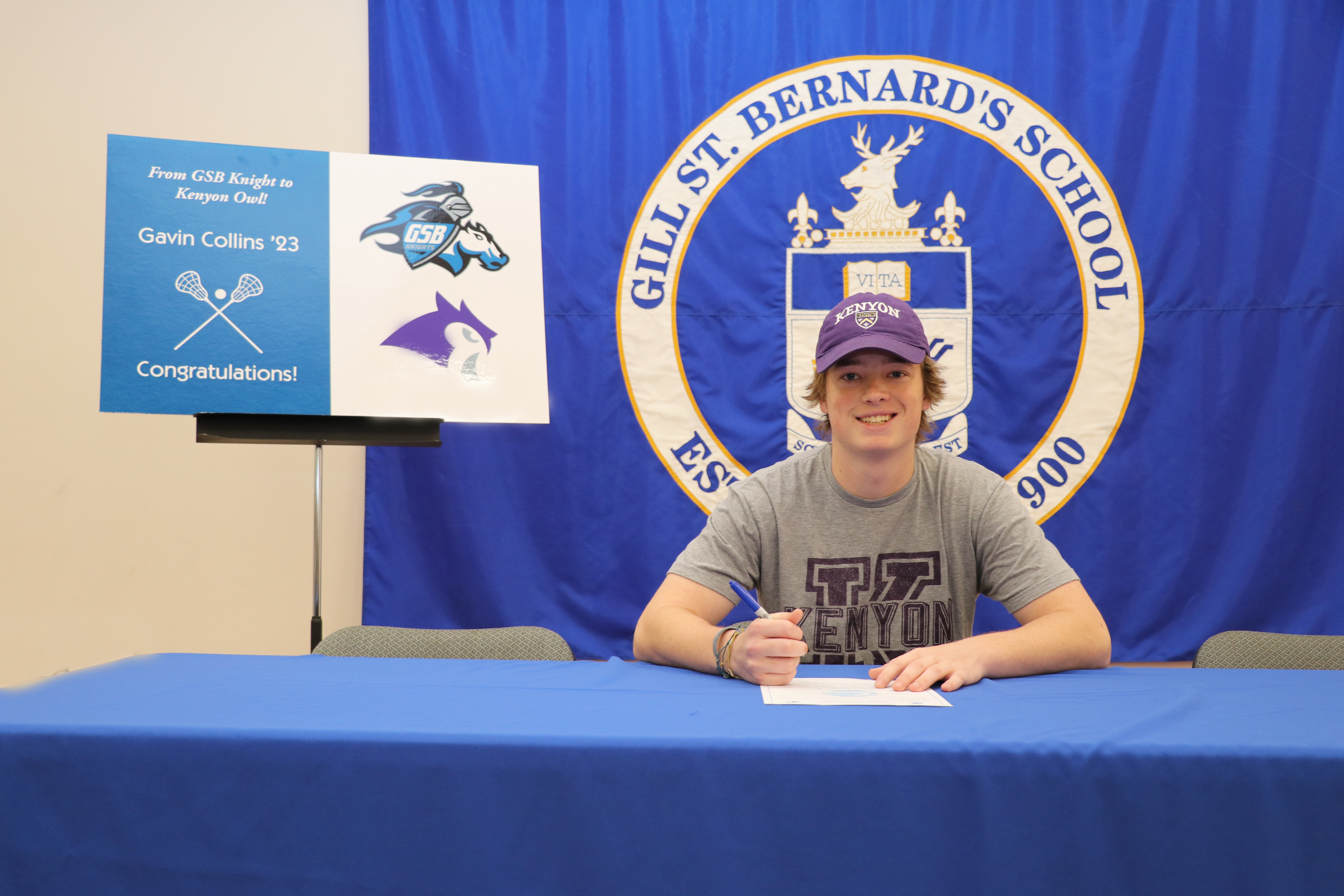 Gavin Collins of Gill St. Bernard's signs a commitment letter to play lacrosse at Kenyon College.