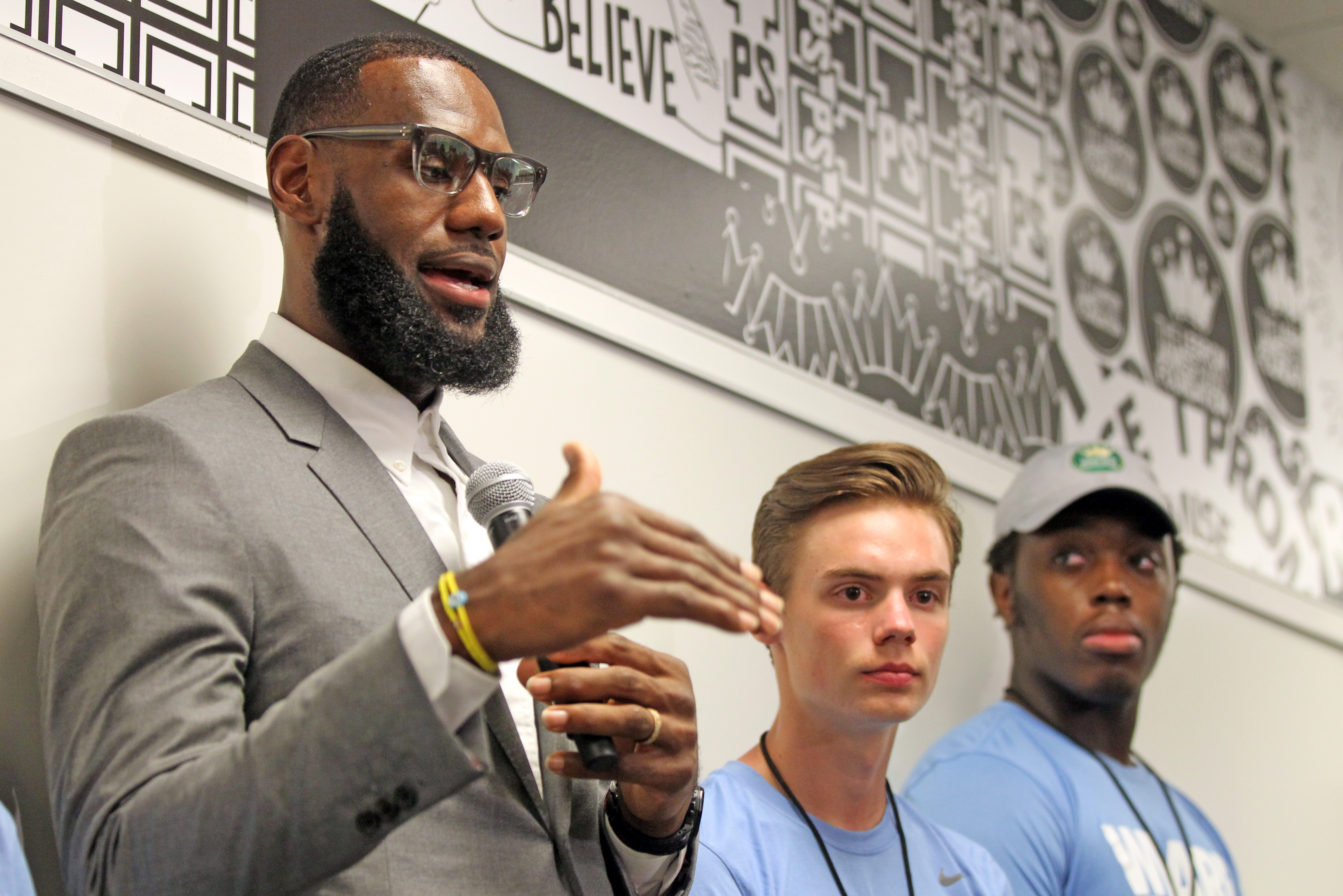 LeBron James answers questions from the media during the grand opening of the LeBron James Family Foundation and Akron Public school's I Promise school Monday, July 30, 2018.  Joshua Gunter, cleveland.com