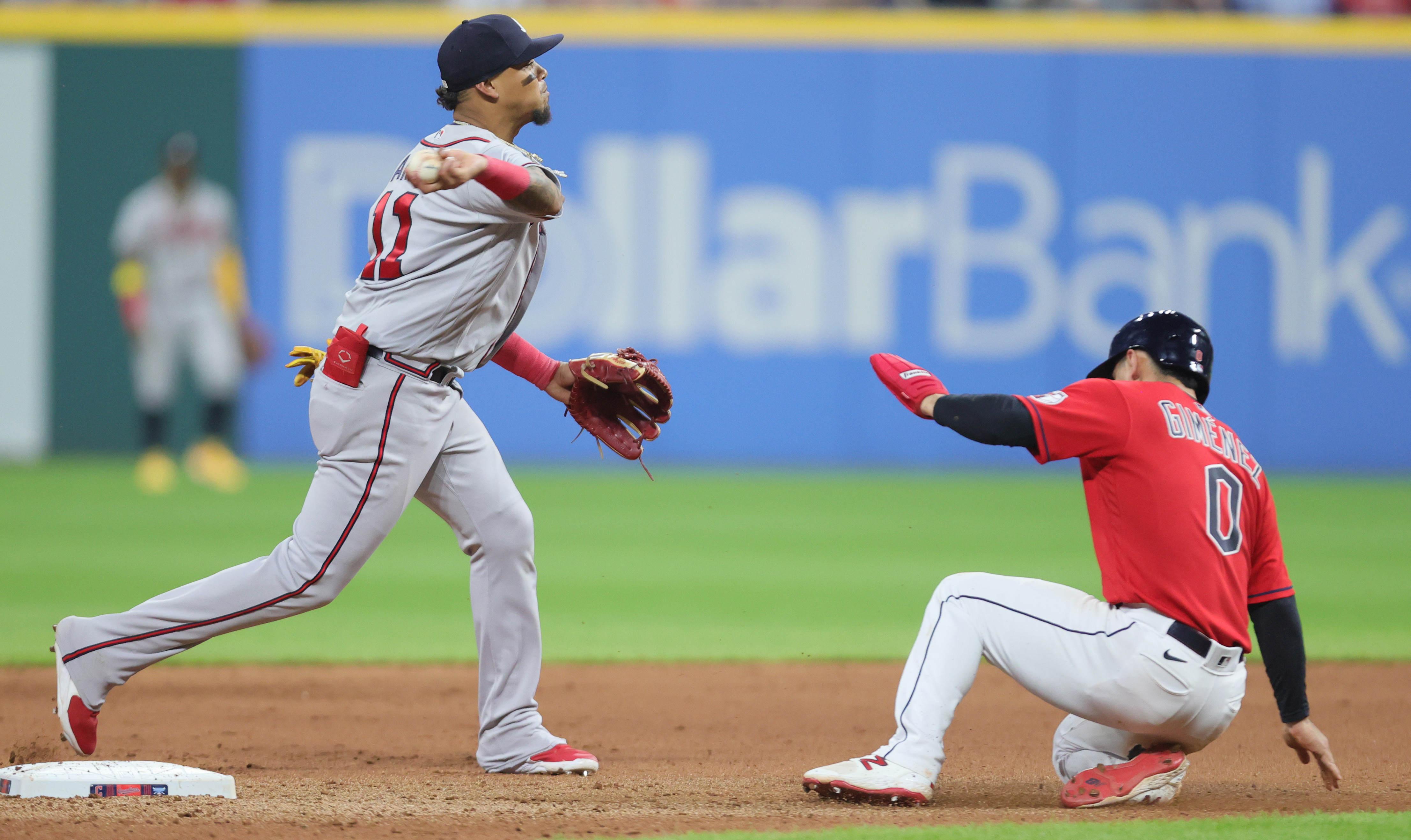 Atlanta Braves shortstop Orlando Arcia throws to first for a