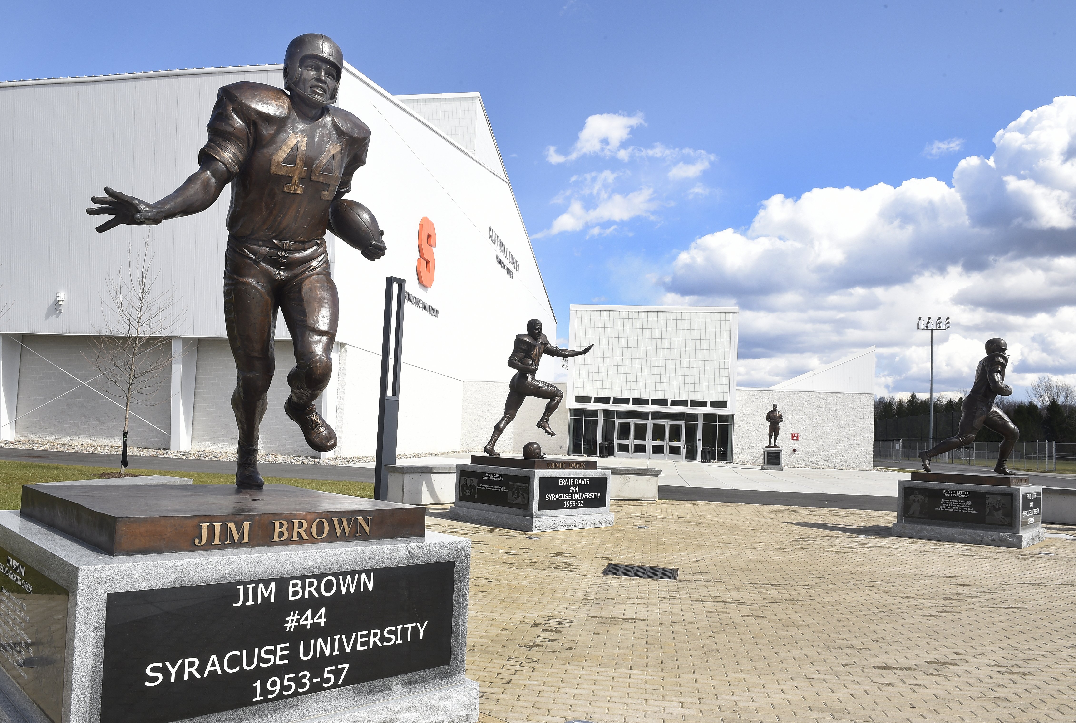 This is the statue courtyard of football super stars at the Clifford J. Ensley Athletic Center, Syracuse University. The statues are of, Jim Brown (from left), Ernie Davis, Floyd "Ben" Schwartzwalder, and Floyd Little.

Ellen M. Blalock | eblalock@syracuse.com