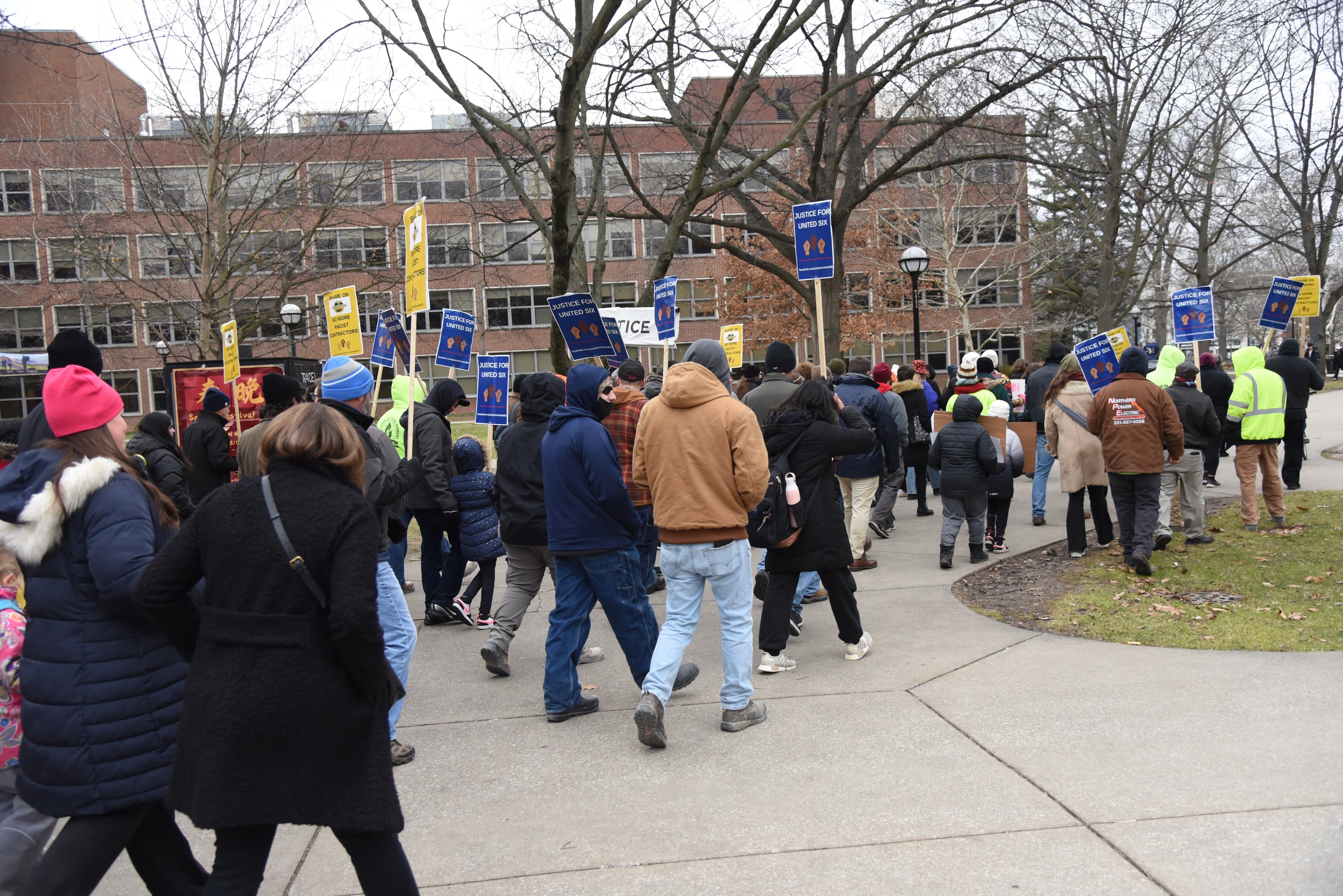 Protesteers Against Mlk Anti-racism demonstration on Martin Luther King Jr. Day in downtown Ann ...